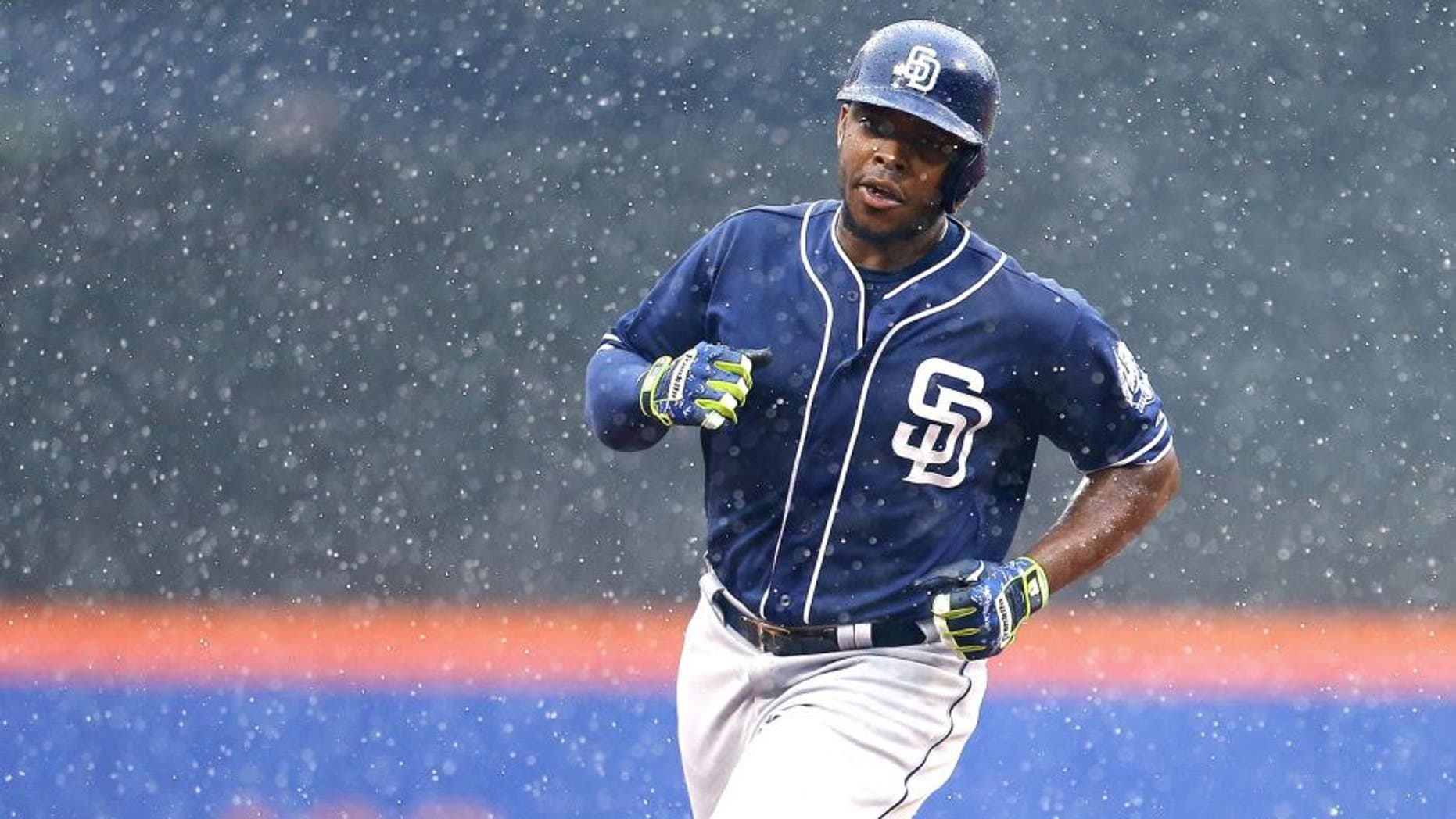 NEW YORK, NY - JULY 30: Justin Upton #10 of the San Diego Padres rounds the bases after hitting a three run home run in the ninth inning against the New York Mets at Citi Field on July 30, 2015 in Flushing neighborhood of the Queens borough of New York City. (Photo by Mike Stobe/Getty Images)