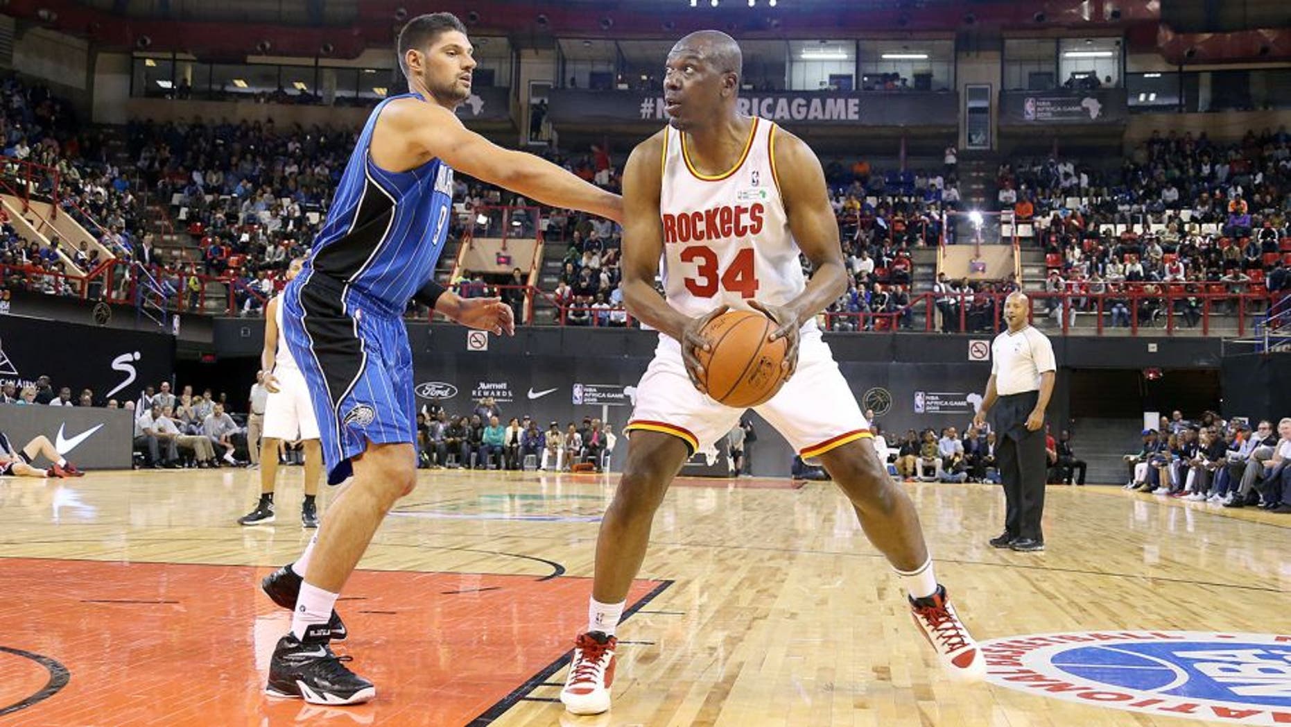 JOHANNESBURG, SA - AUGUST 1: NBA Legend Hakeem Olajuwon guest plays for Team Africa during the NBA Africa Game 2015 as part of Basketball Without Borders on August 1, 2015 at the Ellis Park Arena in Johannesburg, South Africa. NOTE TO USER: User expressly acknowledges and agrees that, by downloading and or using this photograph, User is consenting to the terms and conditions of the Getty Images License Agreement. Mandatory Copyright Notice: Copyright 2015 NBAE (Photo by Nathaniel S. Butler/NBAE via Getty Images)