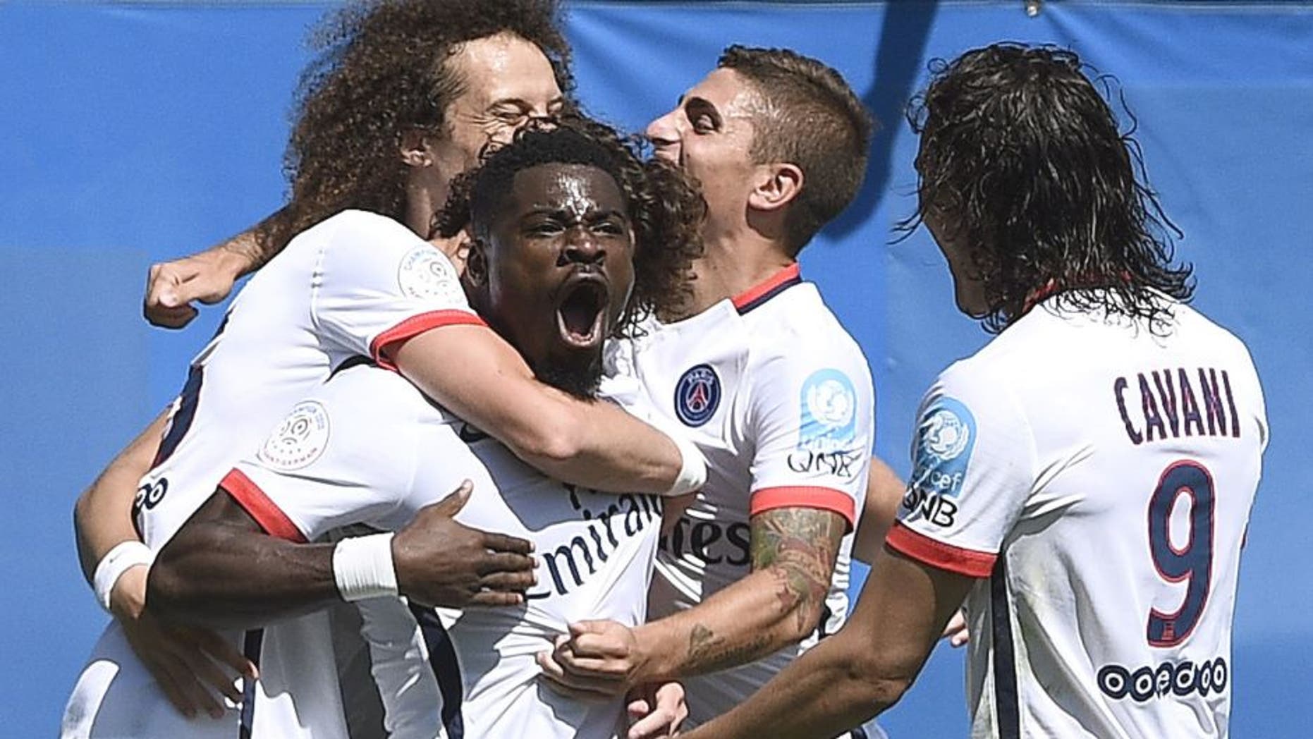 Paris Saint-Germain's French defender Serge Aurier (C) celebrates his goal during the French Trophy of Champions football match against Paris-Saint-Germain vs Lyon at Saputo stadium in Montreal on August 1, 2015 AFP PHOTO / FRANCK FIFE (Photo credit should read FRANCK FIFE/AFP/Getty Images)