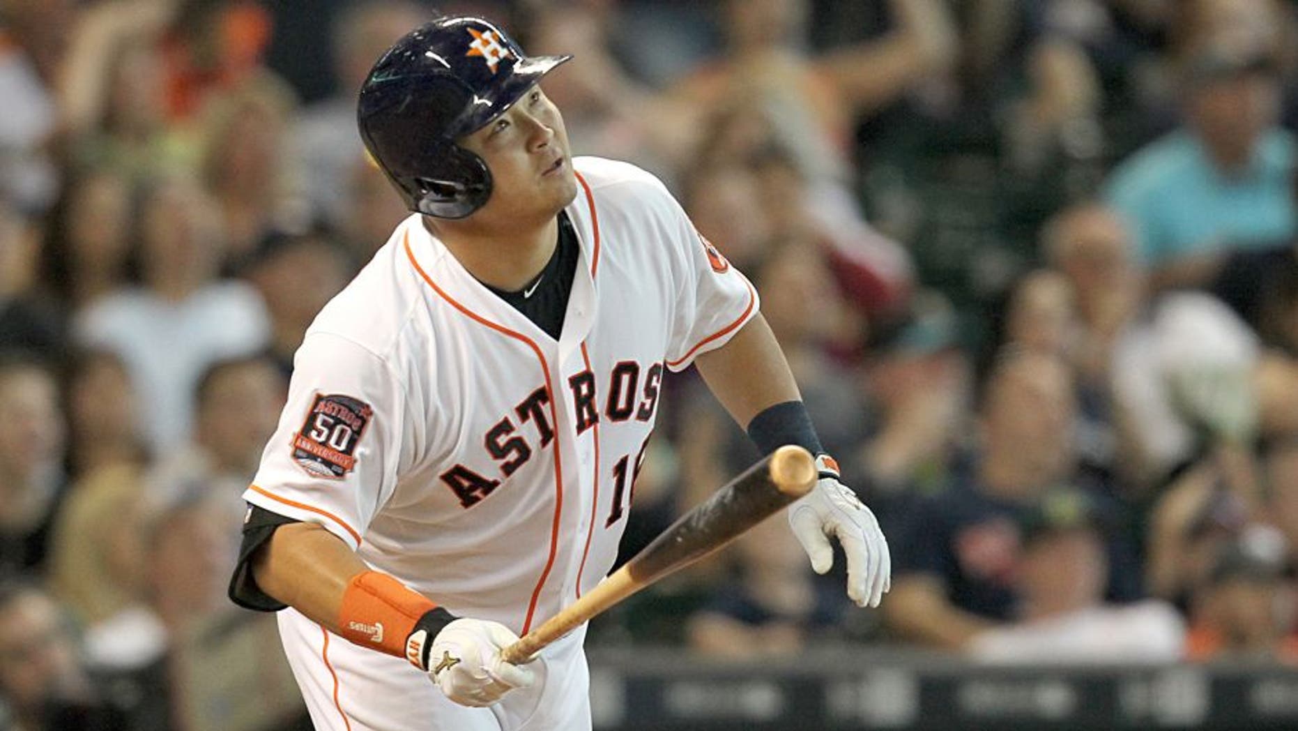 Aug 1, 2015; Houston, TX, USA; Houston Astros catcher Hank Conger (16) hits a grand slam home run against the Arizona Diamondbacks in the fourth inning at Minute Maid Park. Mandatory Credit: Thomas B. Shea-USA TODAY Sports