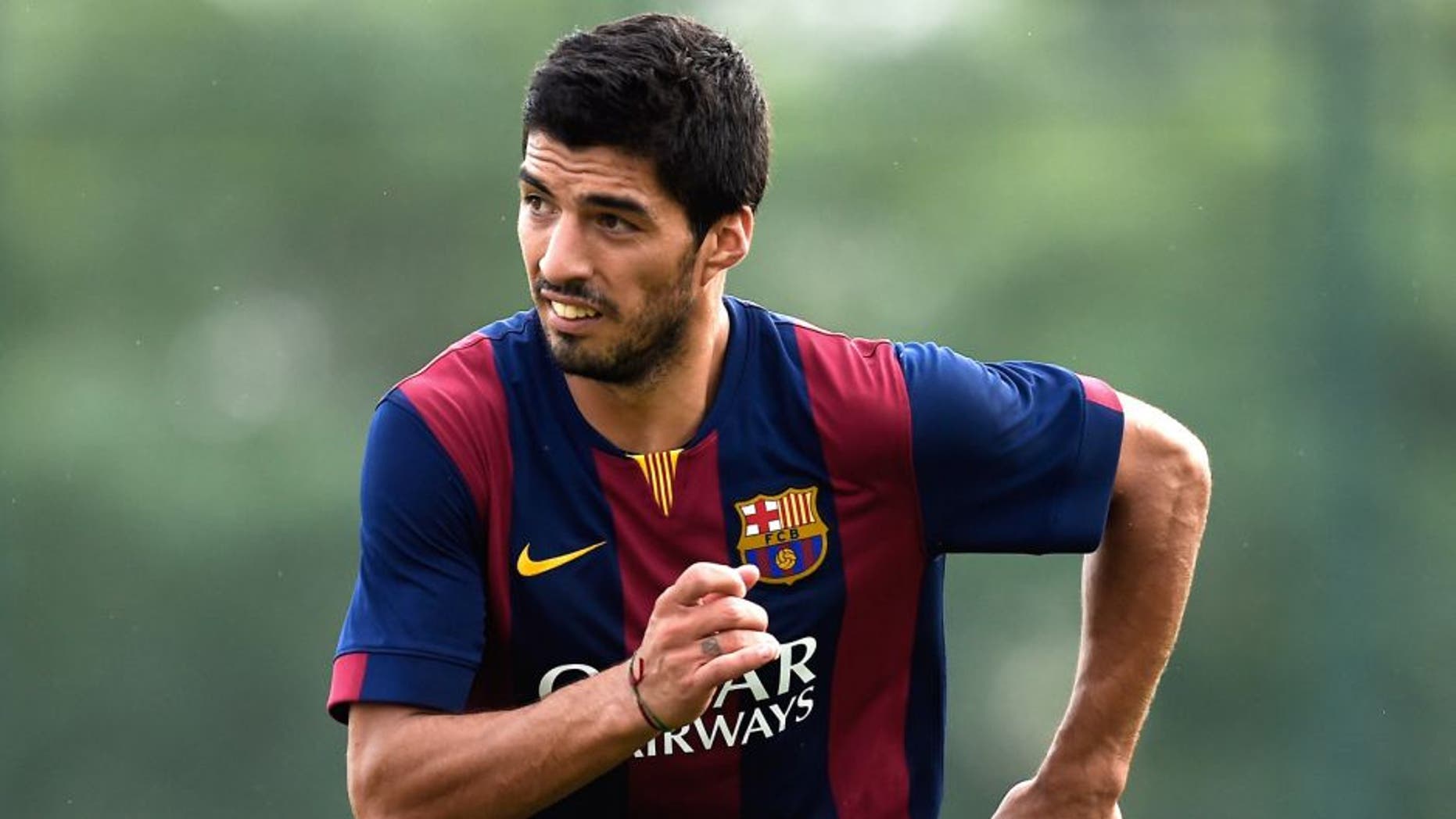 BARCELONA, SPAIN - SEPTEMBER 24: Luis Suarez of FC Barcelona looks on during a friendly match between FC Barcelona B and Indonesia U19 at Ciutat Esportiva on September 24, 2014 in Barcelona, Spain. (Photo by David Ramos/Getty Images)