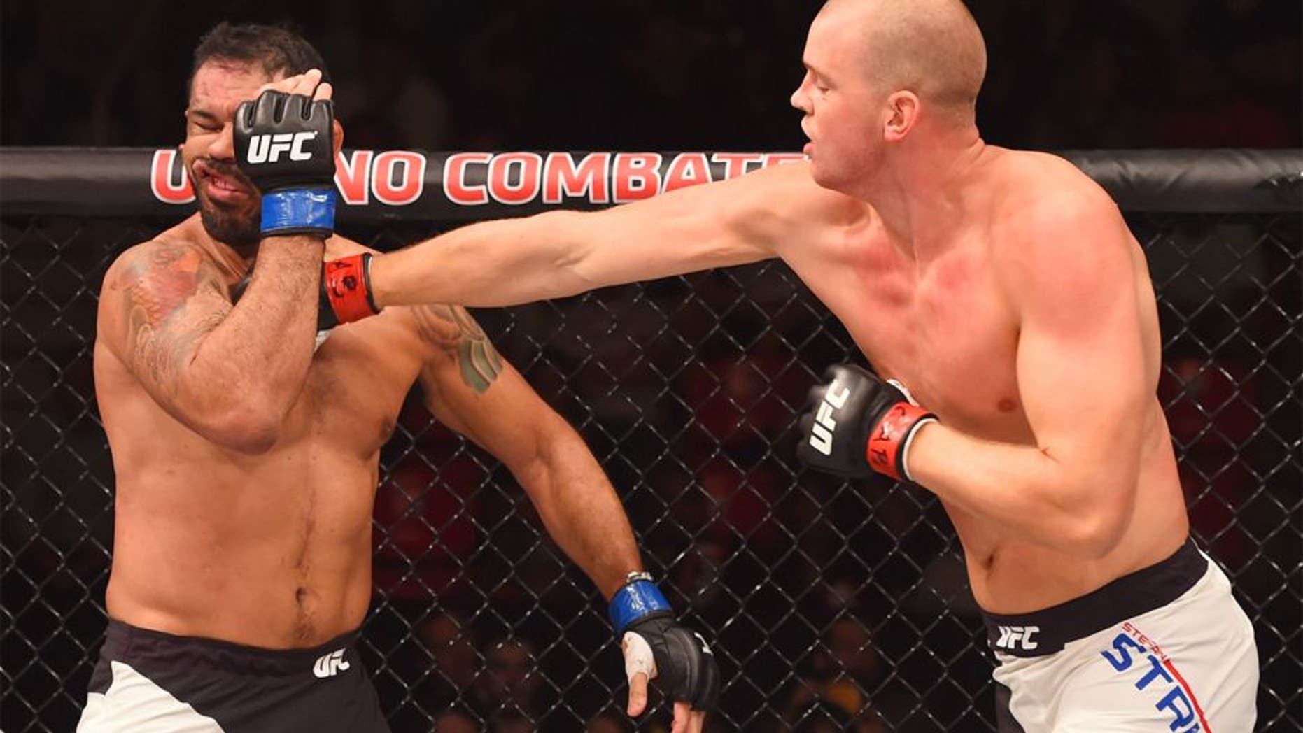 RIO DE JANEIRO, BRAZIL - AUGUST 01: (R-L) Stefan Struve of the Netherlands punches Rodrigo 'Minotauro' Nogueira of Brazil in their heavyweight bout during the UFC 190 event inside HSBC Arena on August 1, 2015 in Rio de Janeiro, Brazil. (Photo by Josh Hedges/Zuffa LLC/Zuffa LLC via Getty Images)