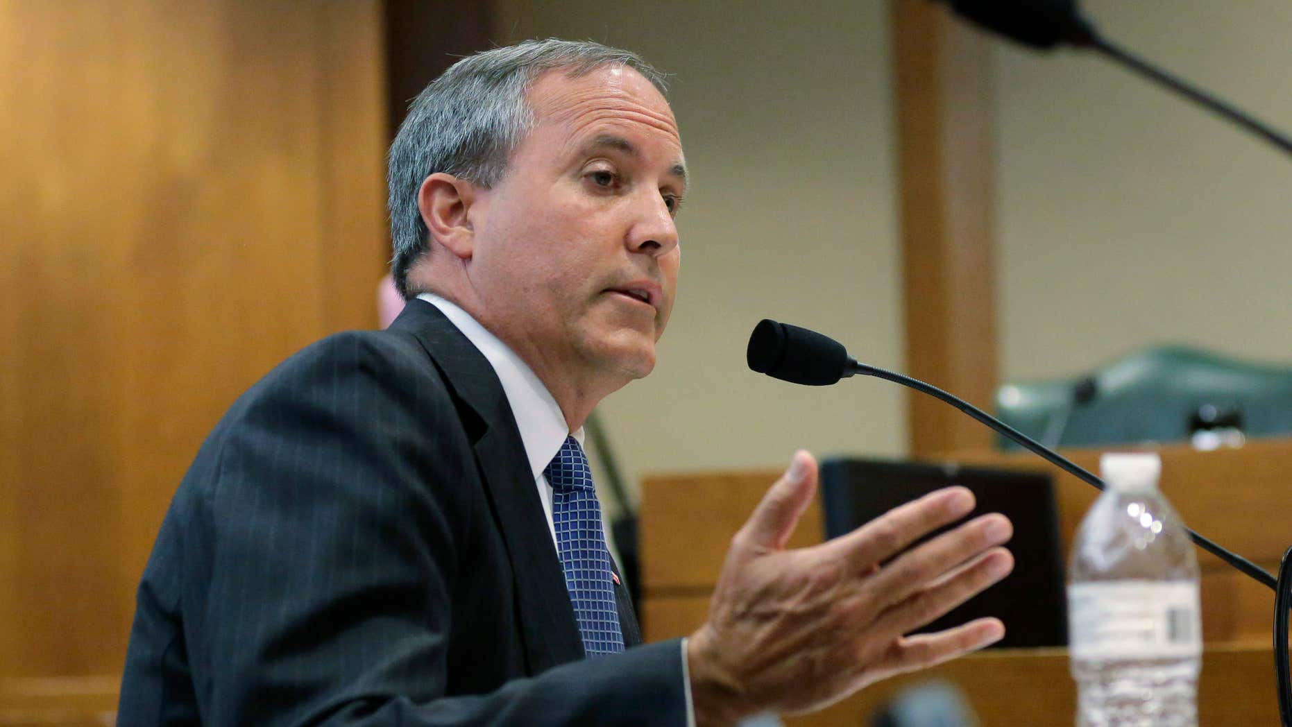 July 29, 2015: Texas Attorney General Ken Paxton speaks during a hearing in Austin, Texas.