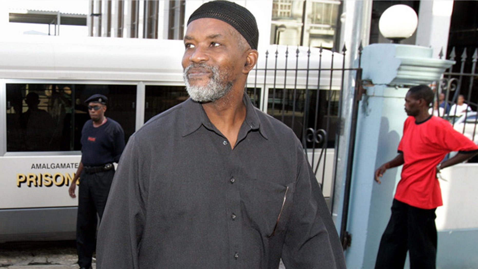 In this Aug. 6, 2007 photo, Guyanese Abdul Kadir, former member of the South American nation's Parliament, arrives at the Magistrates' Court for an extradition hearing in downtown Port-of-Spain, Trinidad.