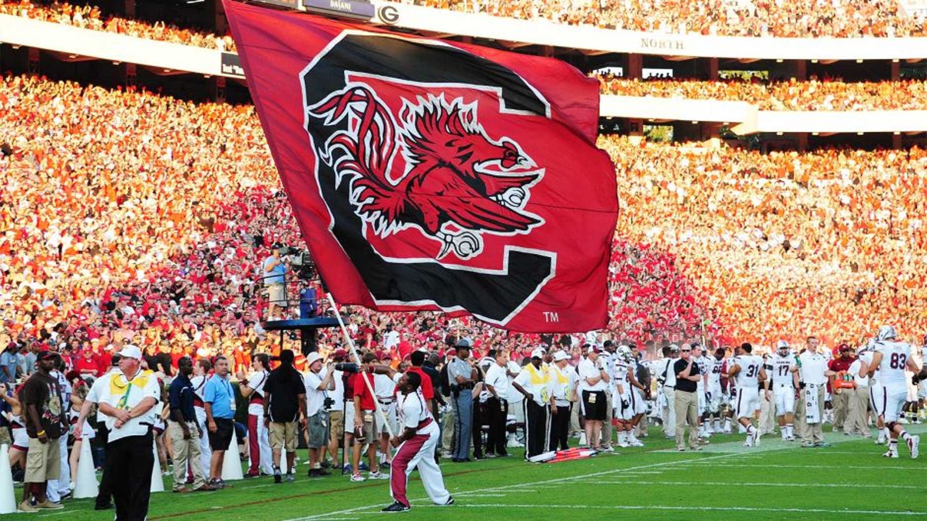 ATHENS, GA - SEPTEMBER 7: A cheerleader of South Carolina Gamecocks celebrates after a touchdown against the Georgia Bulldogs at Sanford Stadium on September 7, 2013 in Athens, Georgia. (Photo by Scott Cunningham/Getty Images)
