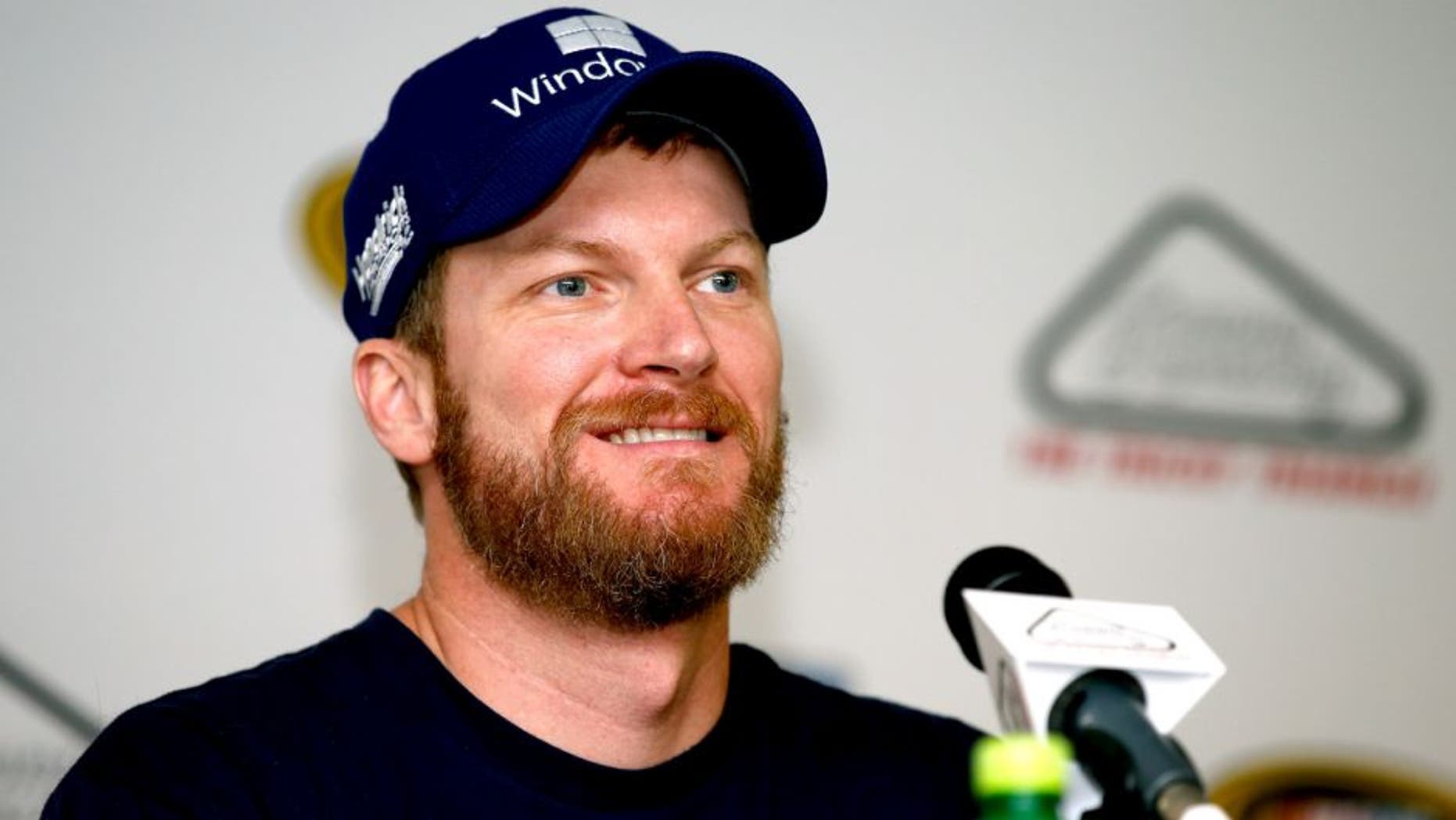 LONG POND, PA - JULY 31: Dale Earnhardt Jr., driver of the #88 Microsoft Chevrolet, speaks to the media following practice for the NASCAR Sprint Cup Series Windows 10 400 at Pocono Raceway on July 31, 2015 in Long Pond, Pennsylvania. (Photo by Todd Warshaw/NASCAR via Getty Images)