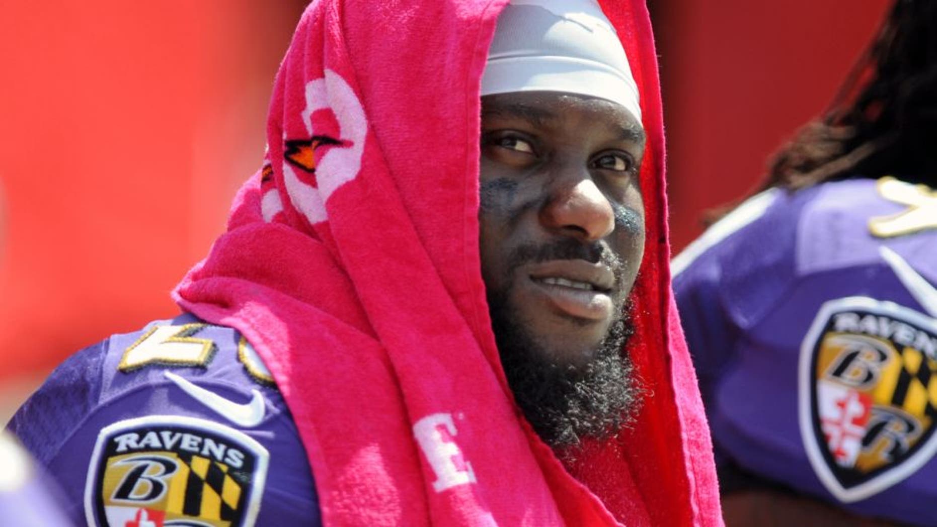 TAMPA, FL - OCTOBER 12: Strong safety Matt Elam #26 of the Baltimore Ravens sits on the sidelines against the Tampa Bay Buccaneers at Raymond James Stadium on October 12, 2014 in Tampa, Florida. (Photo by Cliff McBride/Getty Images)