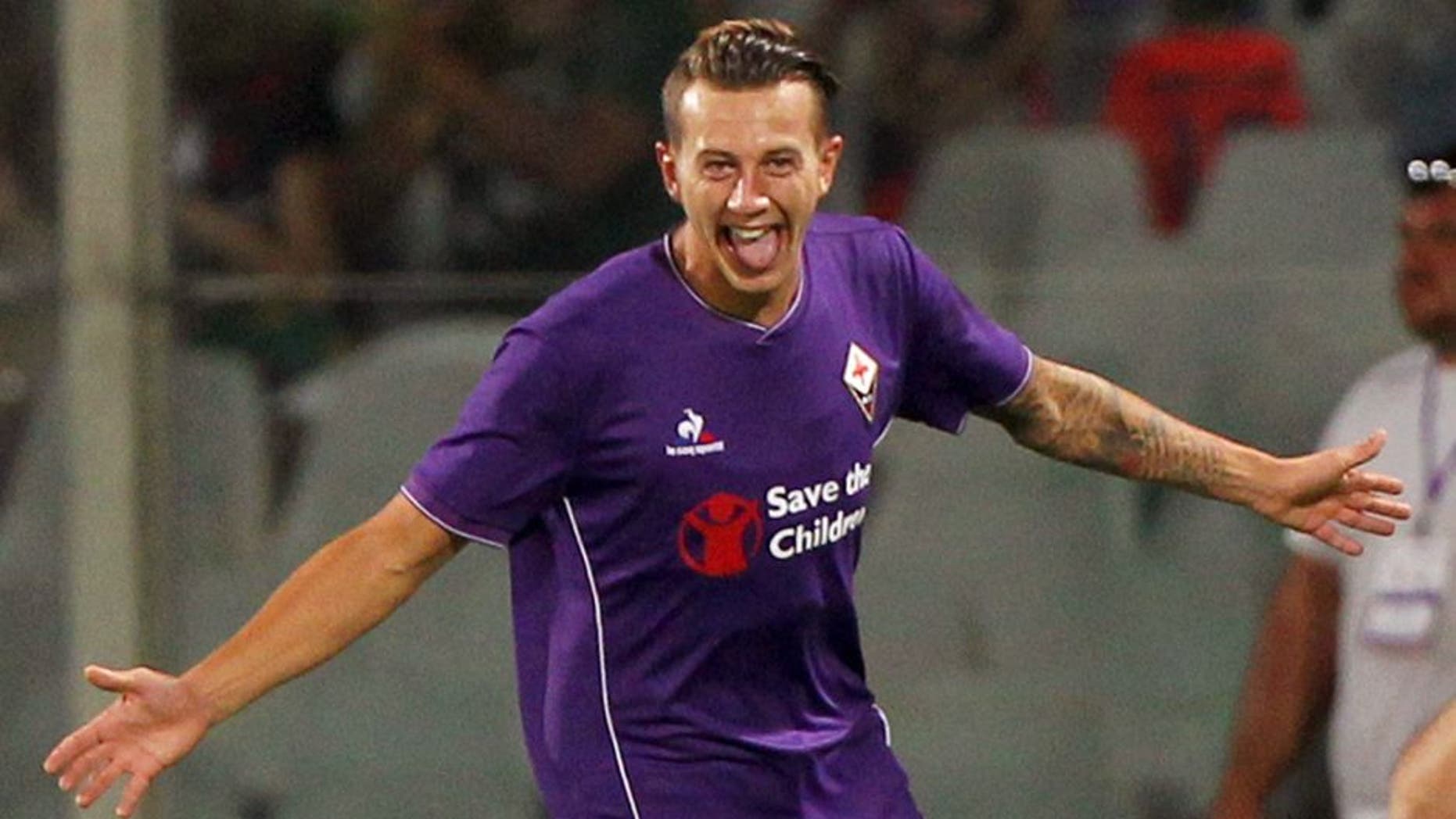 FLORENCE, ITALY - AUGUST 02: Federico Bernardeschi of ACF Fiorentina celebrates after scoring the opening goal during the preseason friendly match between ACF Fiorentina and FC Barcelona at Artemio Franchi on August 2, 2015 in Florence, Italy. (Photo by Paolo Bruno/Getty Images)