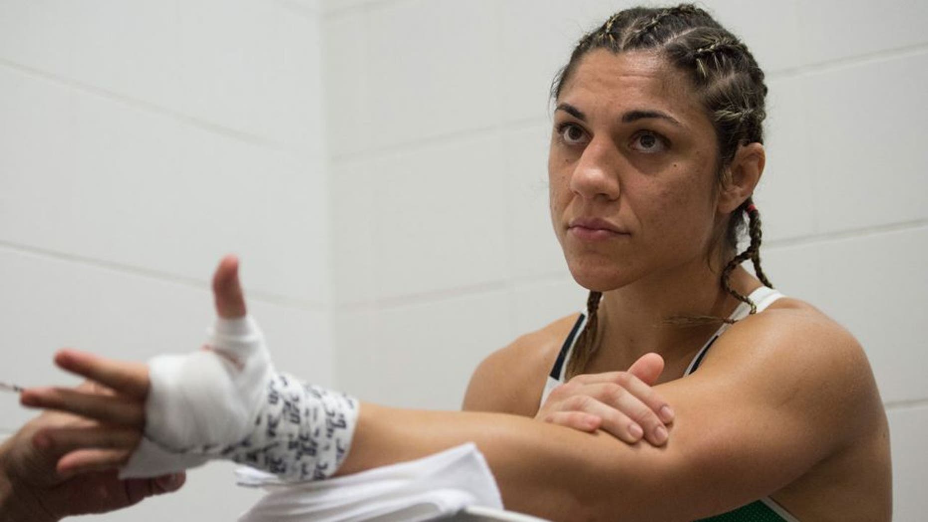 RIO DE JANEIRO, BRAZIL - AUGUST 01: Bethe Correia of Brazil gets her hands wrapped backstage during the UFC 190 event inside HSBC Arena on August 1, 2015 in Rio de Janeiro, Brazil. (Photo by Jeff Bottari/Zuffa LLC/Zuffa LLC via Getty Images)