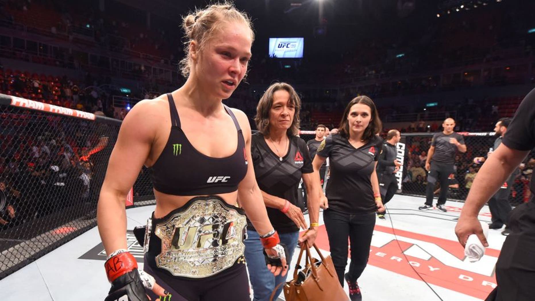 RIO DE JANEIRO, BRAZIL - AUGUST 01: Ronda Rousey of the United States celebrates her knock out victory over Bethe Correia of Brazil in the first round in their UFC women's bantamweight championship bout during the UFC 190 event inside HSBC Arena on August 1, 2015 in Rio de Janeiro, Brazil. (Photo by Josh Hedges/Zuffa LLC/Zuffa LLC via Getty Images)