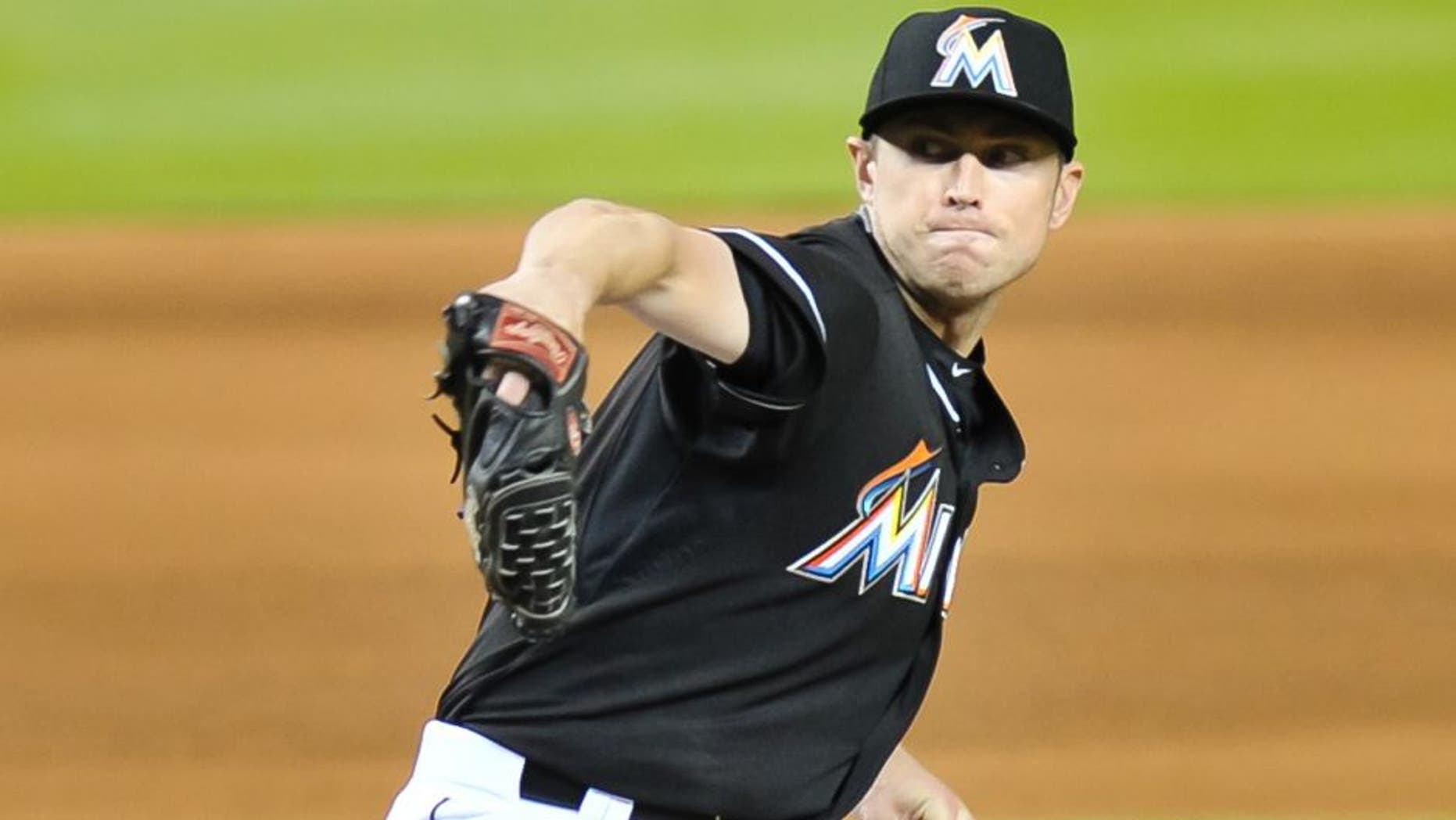 Aug 1, 2015; Miami, FL, USA; Miami Marlins relief pitcher Chris Reed (35) throws against the San Diego Padres during the eighth inning at Marlins Park. Mandatory Credit: Steve Mitchell-USA TODAY Sports