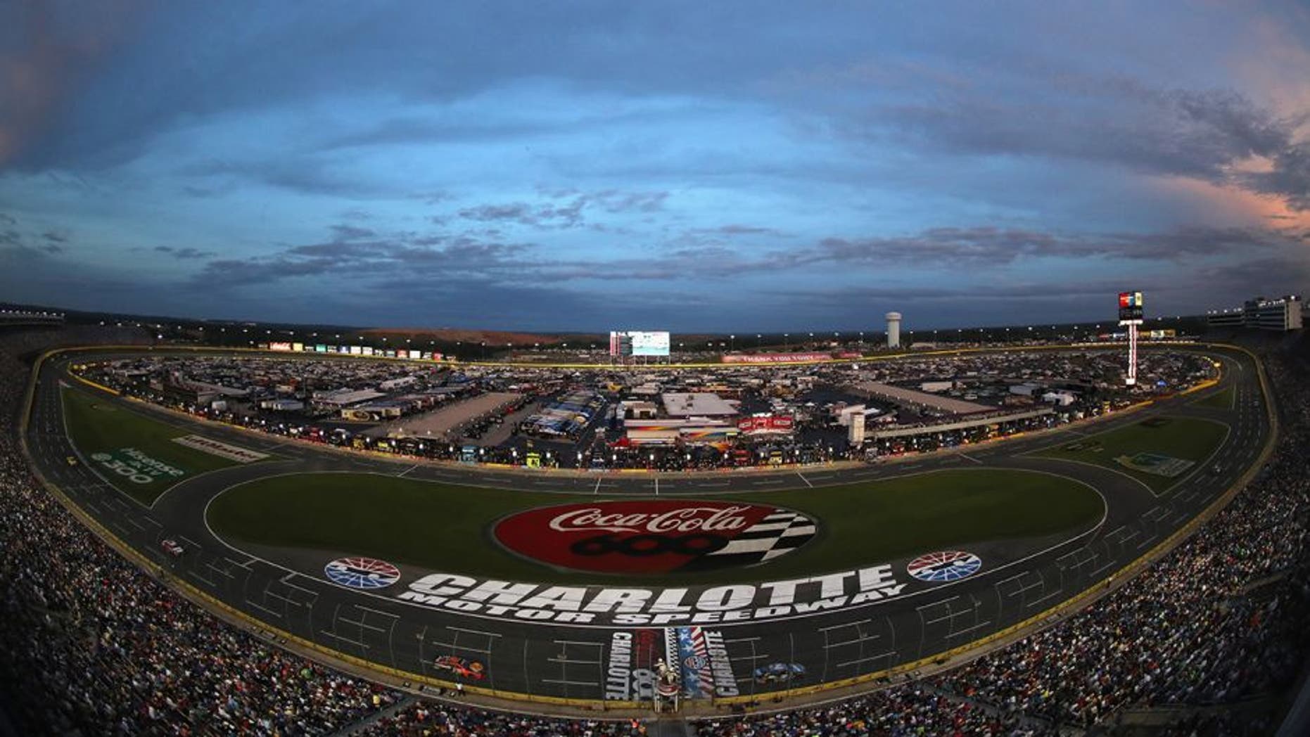 CHARLOTTE, NC - MAY 29: A general view of cars racing during the NASCAR Sprint Cup Series Coca-Cola 600 at Charlotte Motor Speedway on May 29, 2016 in Charlotte, North Carolina. (Photo by Streeter Lecka/Getty Images)