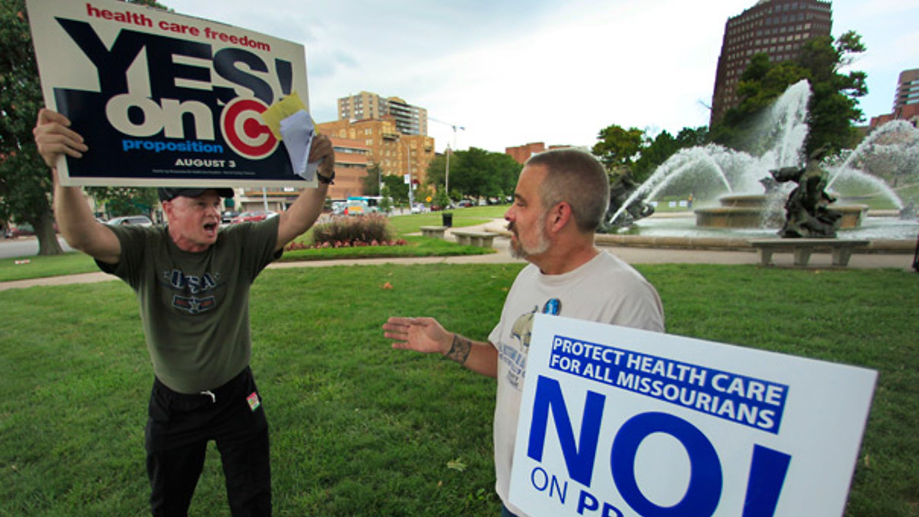July 29: Proposition C supporter and opponent debate during a rally in Kansas City, Mo.