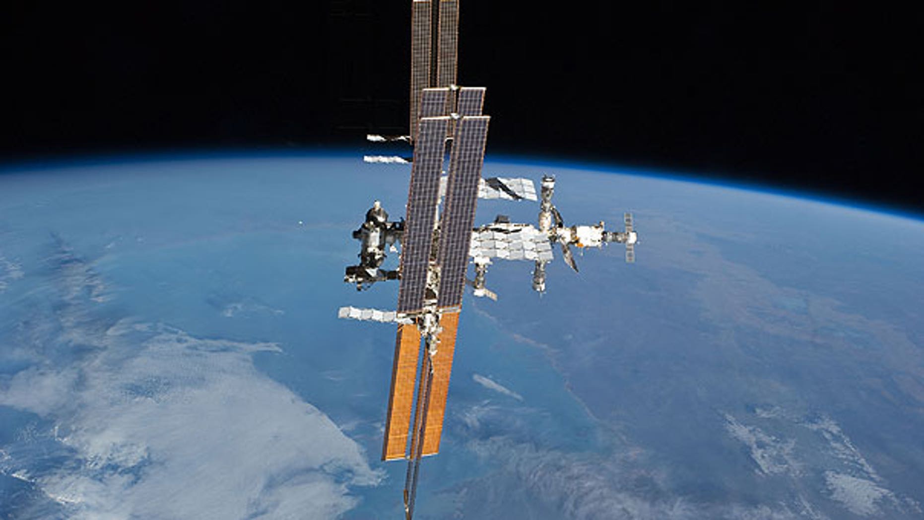 July 19: The International Space Station, photographed from the space shuttle Atlantis as the orbiting complex and the shuttle performed their relative separation.