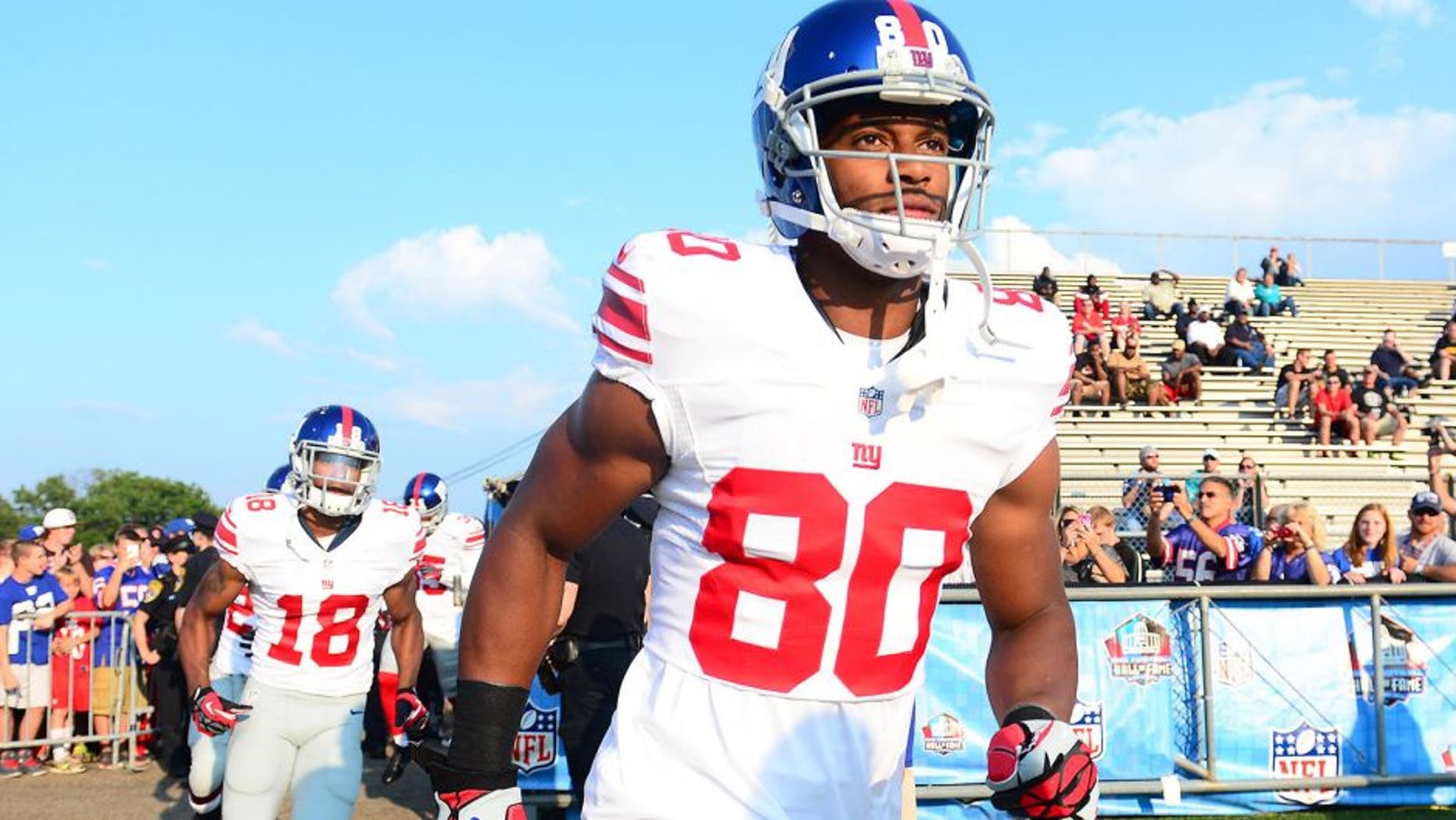 Aug 3, 2014; Canton, OH, USA; New York Giants wide receiver Victor Cruz (80) prior to the 2014 Pro Football Hall of Fame game against the Buffalo Bills at Fawcett Stadium. Mandatory Credit: Andrew Weber-USA TODAY Sports