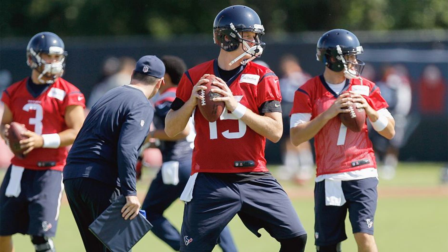 HOUSTON, TX - JUNE 01: Ryan Mallett #15 of the Houston Texans works out during an NFL football organized team activity on June 1, 2015 in Houston, Texas. (Photo by Bob Levey/Getty Images)