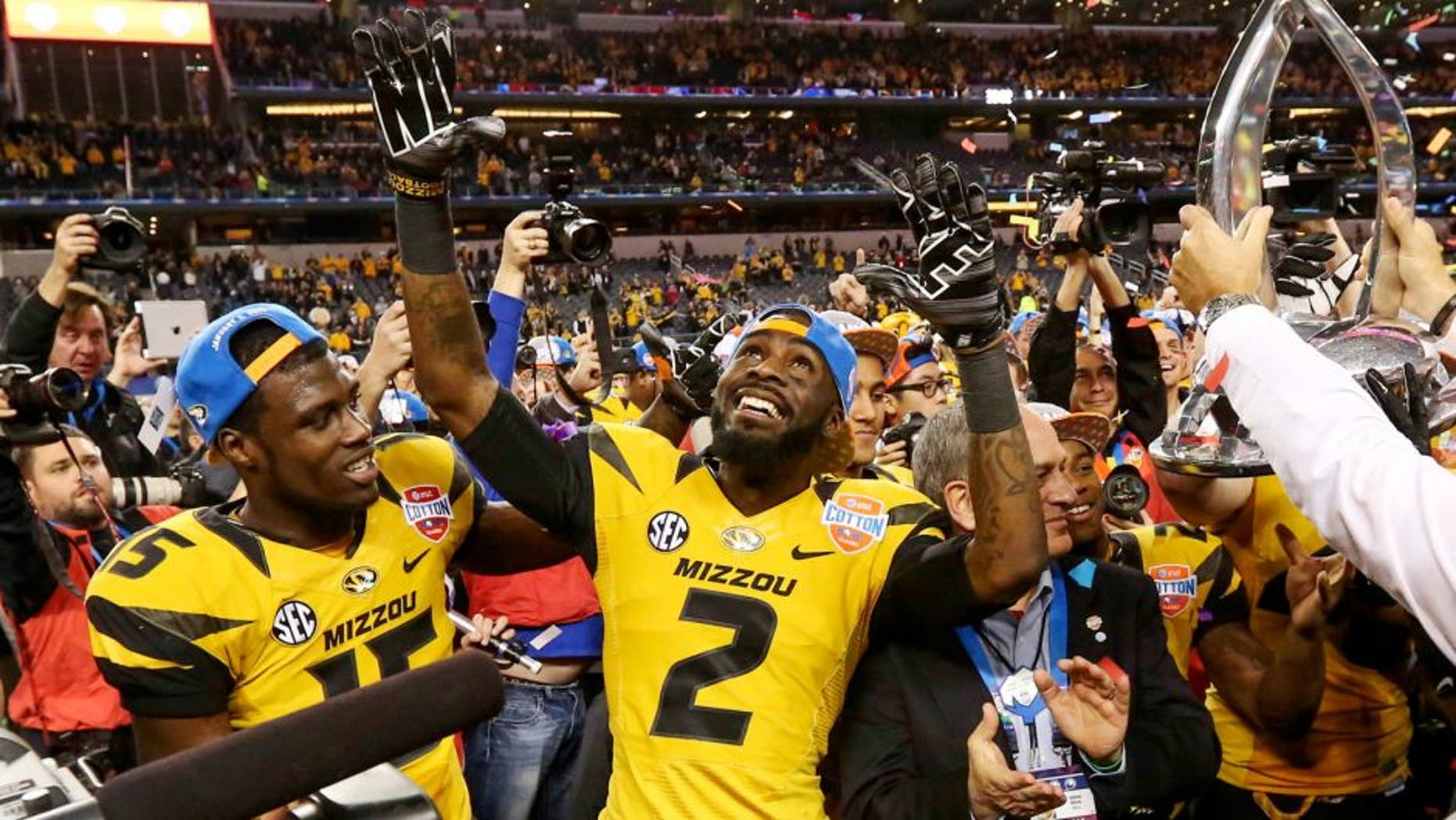 Jan 3, 2014; Arlington, TX, USA; Missouri Tigers wide receiver Dorial Green-Beckham (left) and wide receiver L'Damian Washington (2) celebrate the victory against the Oklahoma State Cowboys in the 2014 Cotton Bowl at AT&T Stadium. Missouri won 41-31. Mandatory Credit: Kevin Jairaj-USA TODAY Sports