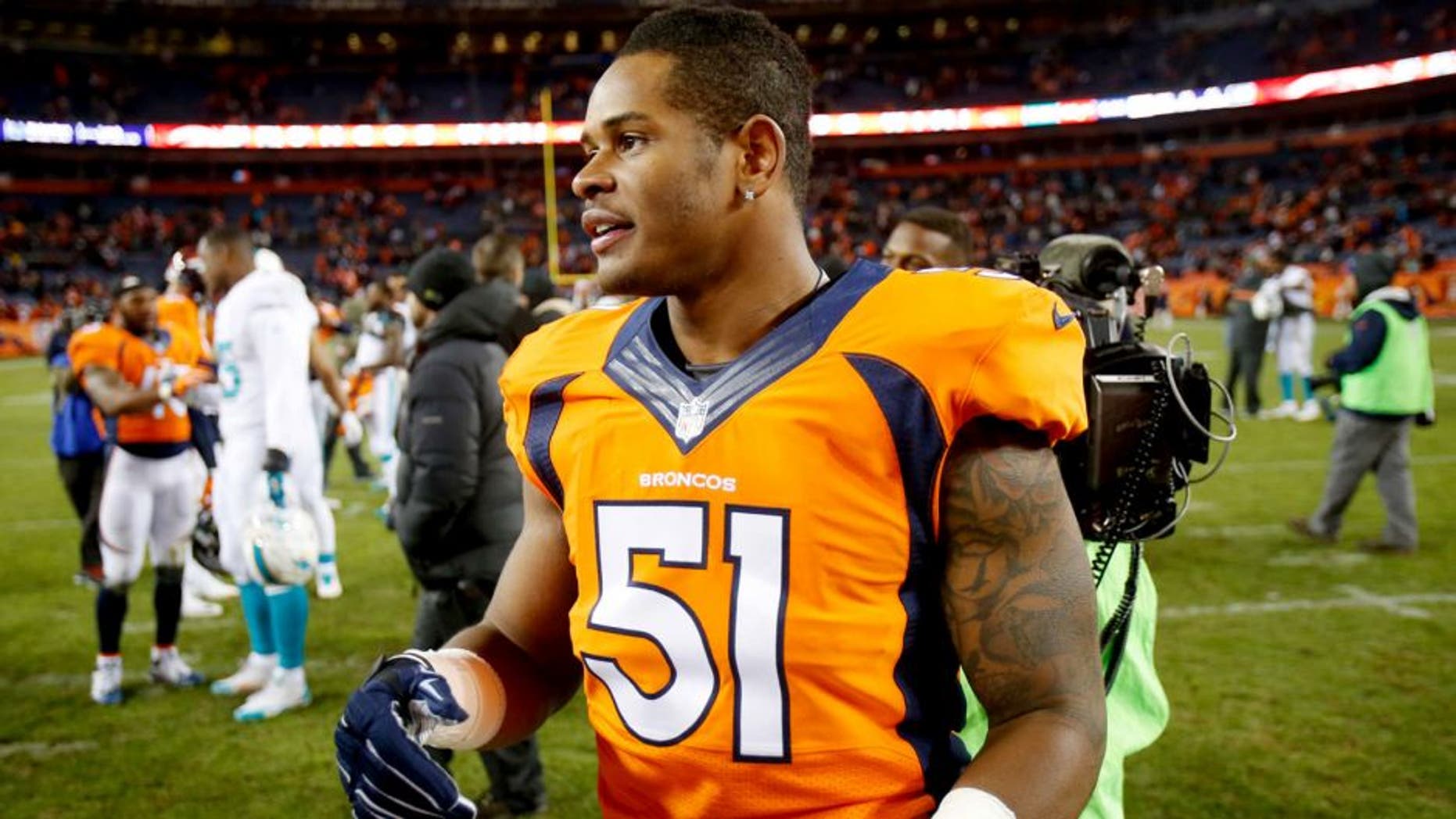 Nov 23, 2014; Denver, CO, USA; Denver Broncos linebacker Todd Davis (51) after the game against the Miami Dolphins at Sports Authority Field at Mile High. Mandatory Credit: Chris Humphreys-USA TODAY Sports