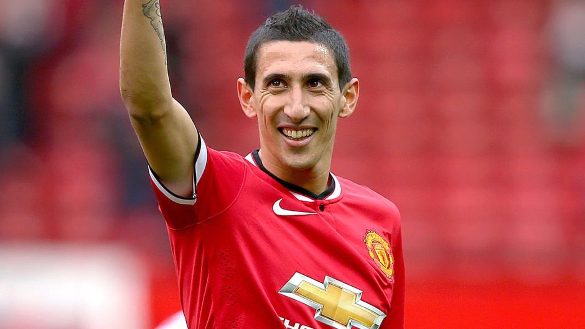 MANCHESTER, ENGLAND - APRIL 04: Angel di Maria of Manchester United gives a thumbs up to the crowd after the Barclays Premier League match between Manchester United and Aston Villa at Old Trafford on April 4, 2015 in Manchester, England. (Photo by Alex Livesey/Getty Images)