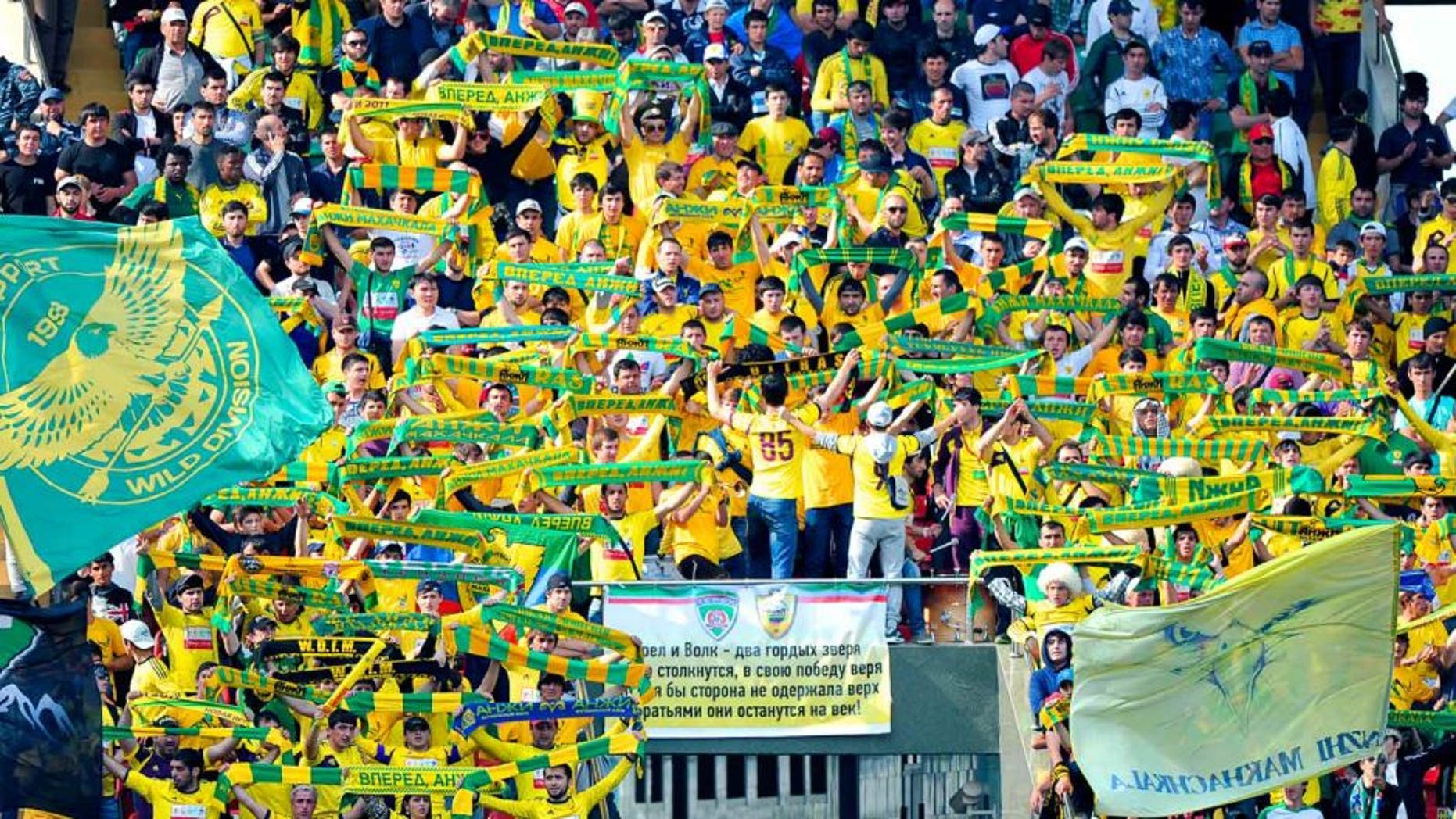 GROZNY, RUSSIA - MAY 12: FC Anzhi Makhachkala fans during the Russian Premier League match between FC Terek Grozny and FC Anzhi Makhachkala at the Akhmad-Arena Stadium on May 12, 2013 in Grozny, Russia. (Photo by Sergey Rasulov Jr/Epsilon/Getty Images)