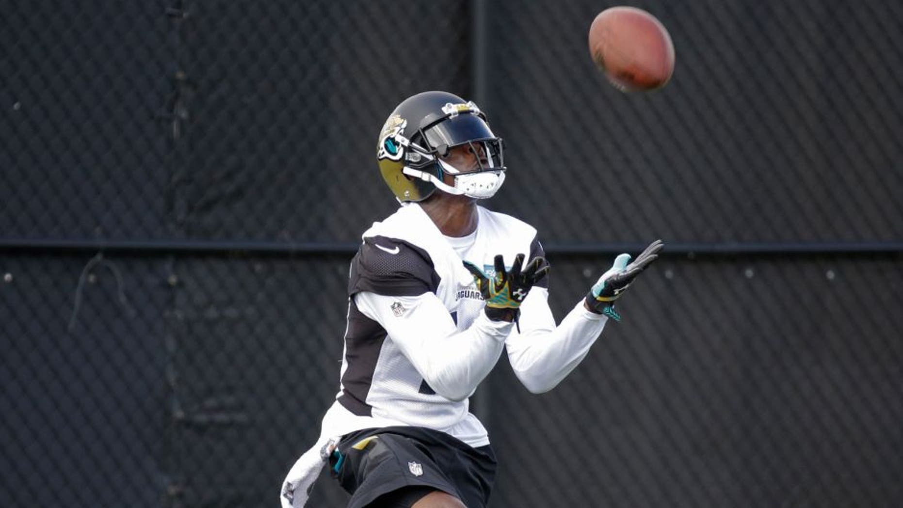 Jacksonville Jaguars' Marqise Lee catches a punt for a return during practice at NFL football training camp, Saturday, Aug. 1, 2015, in Jacksonville, Fla. (AP Photo/John Raoux)