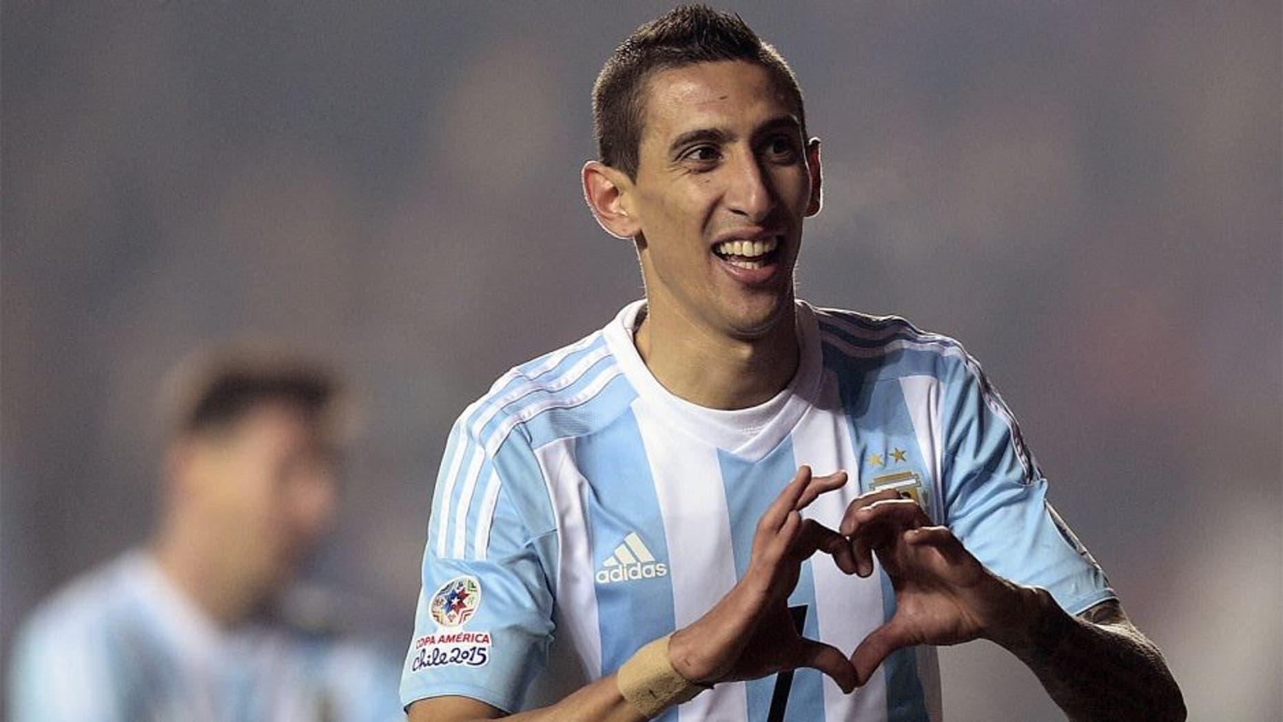 Argentina's forward Angel Di Maria celebrates after scoring against Paraguay during their Copa America semifinal football match in Concepcion, Chile on June 30, 2015. AFP PHOTO / JUAN MABROMATA (Photo credit should read JUAN MABROMATA/AFP/Getty Images)