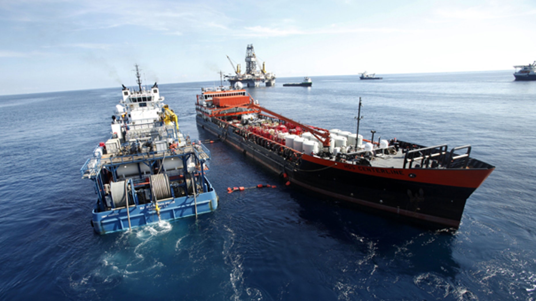 Aug 3: Ships are seen delivering the mud through hoses at the site of the Deepwater Horizon Oil Spill in Gulf of Mexico.