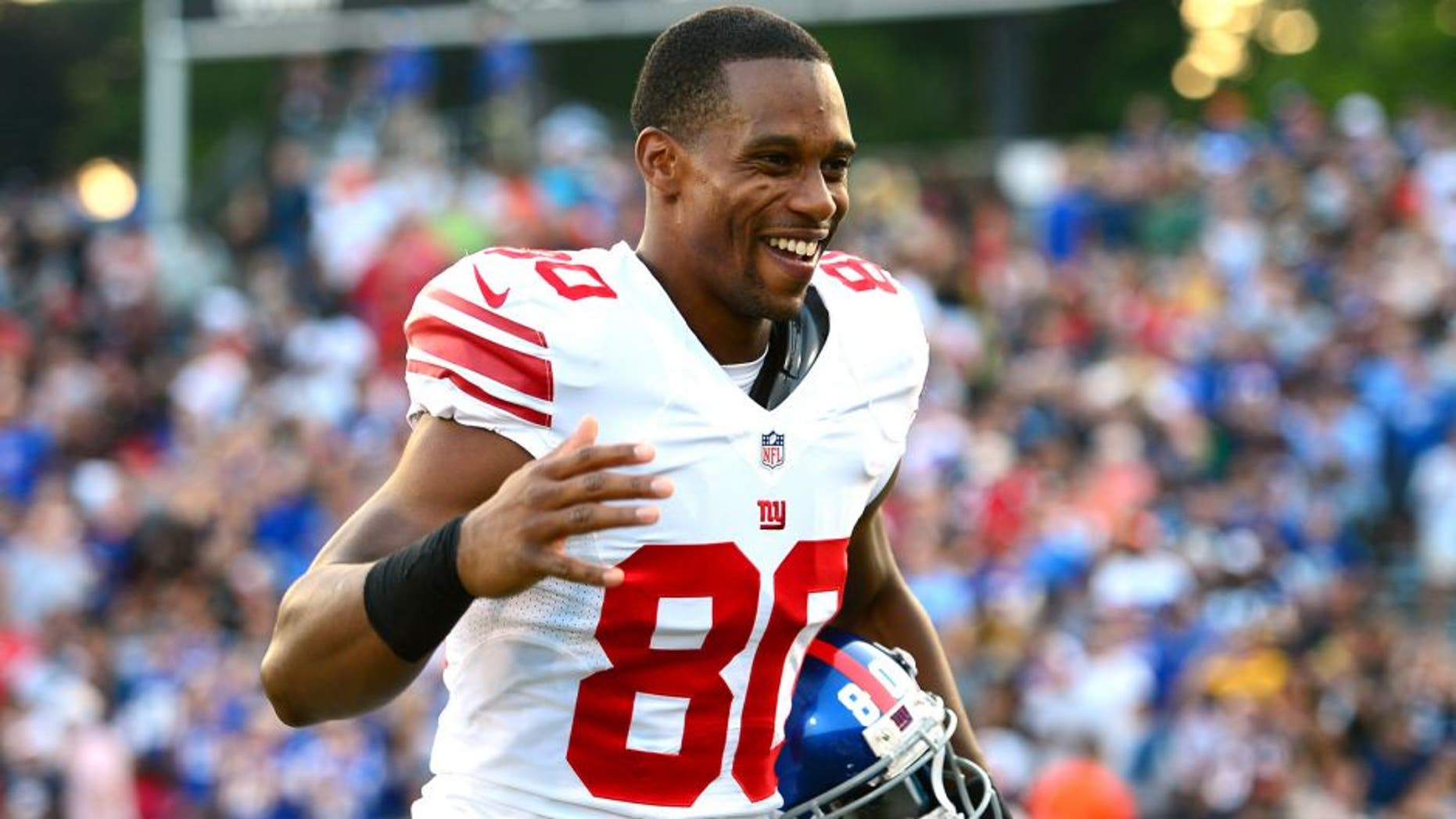 Aug 3, 2014; Canton, OH, USA; New York Giants wide receiver Victor Cruz (80) reacts prior to the 2014 Pro Football Hall of Fame game against the Buffalo Bills at Fawcett Stadium. Mandatory Credit: Andrew Weber-USA TODAY Sports