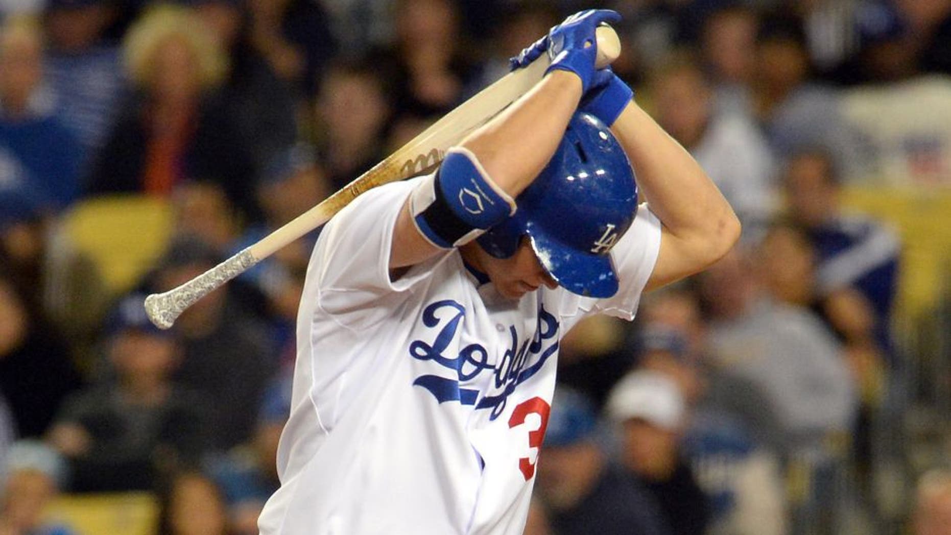 May 23, 2015; Los Angeles, CA, USA; Los Angeles Dodgers center fielder Joc Pederson (31) flips his bat in frustration after striking out in the eighth inning of the game against the San Diego Padres at Dodger Stadium. Dodgers won 2-0. Mandatory Credit: Jayne Kamin-Oncea-USA TODAY Sports