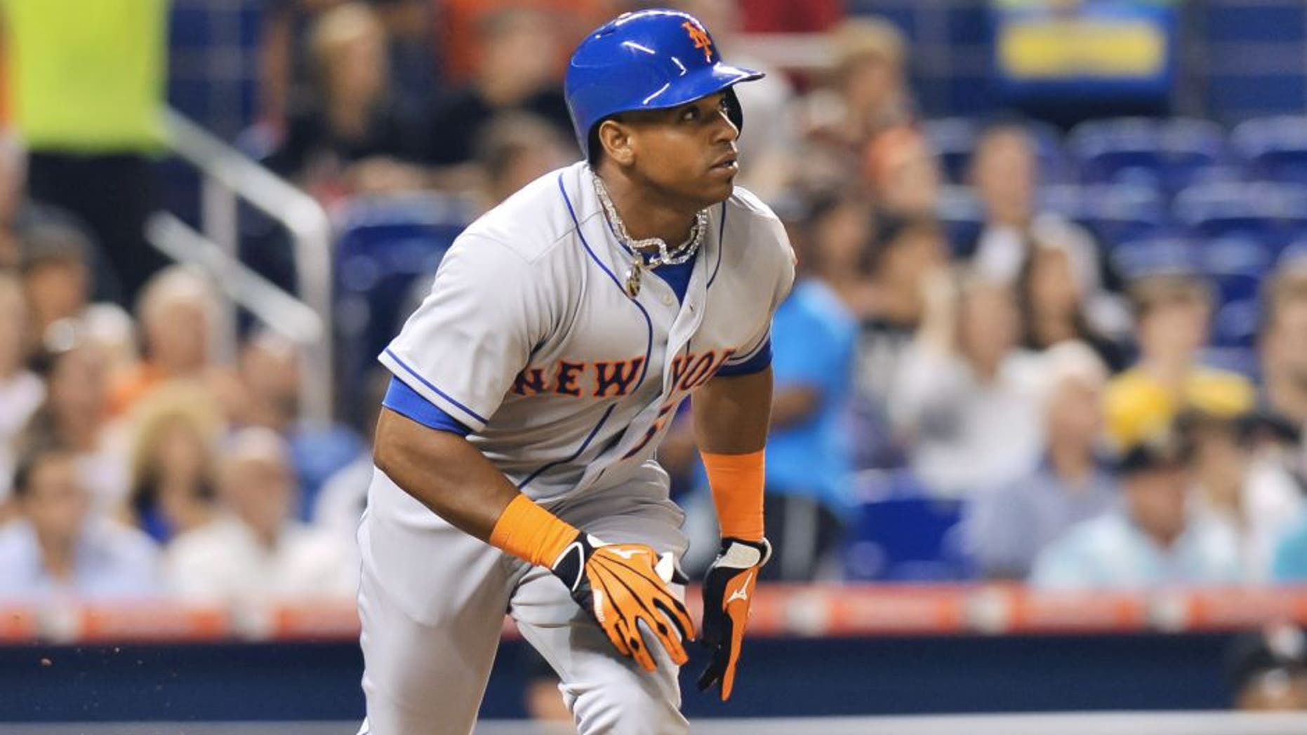 Aug 3, 2015; Miami, FL, USA; New York Mets center fielder Yoenis Cespedes (52) connects for an two run RBI double during the fifth inning against the Miami Marlins at Marlins Park. Mandatory Credit: Steve Mitchell-USA TODAY Sports