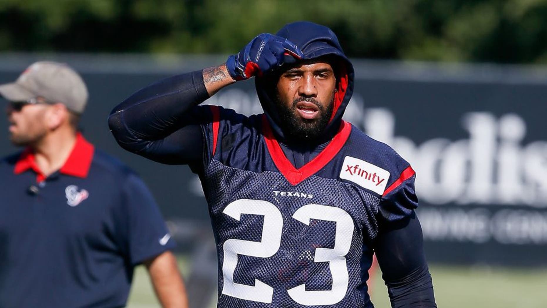 Houston Texans running back Arian Foster (23) walks from one field to another during NFL football training camp at the Methodist Training Center on Sunday, Aug. 2, 2015, in Houston. (AP Photo/Bob Levey)
