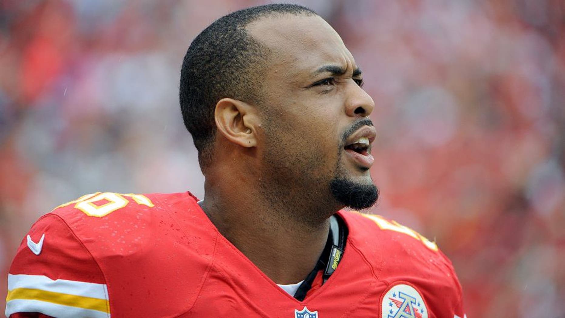 Sep 15, 2013; Kansas City, MO, USA; Kansas City Chiefs inside linebacker Derrick Johnson (56) looks to the crowd before the game with the Dallas Cowboys at Arrowhead Stadium. Kansas City won the game 17-16. Mandatory Credit: John Rieger-USA TODAY Sports