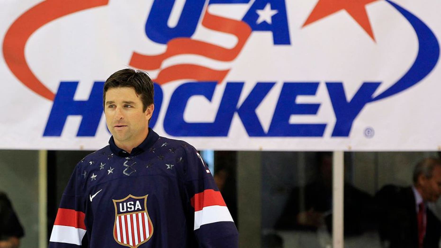 Former NHL player and Olympic team member Chris Drury walks onto the ice in 2013, in preparation for the 2014 Winter Olympics. NHL stars will not participate in the 2018 Games.