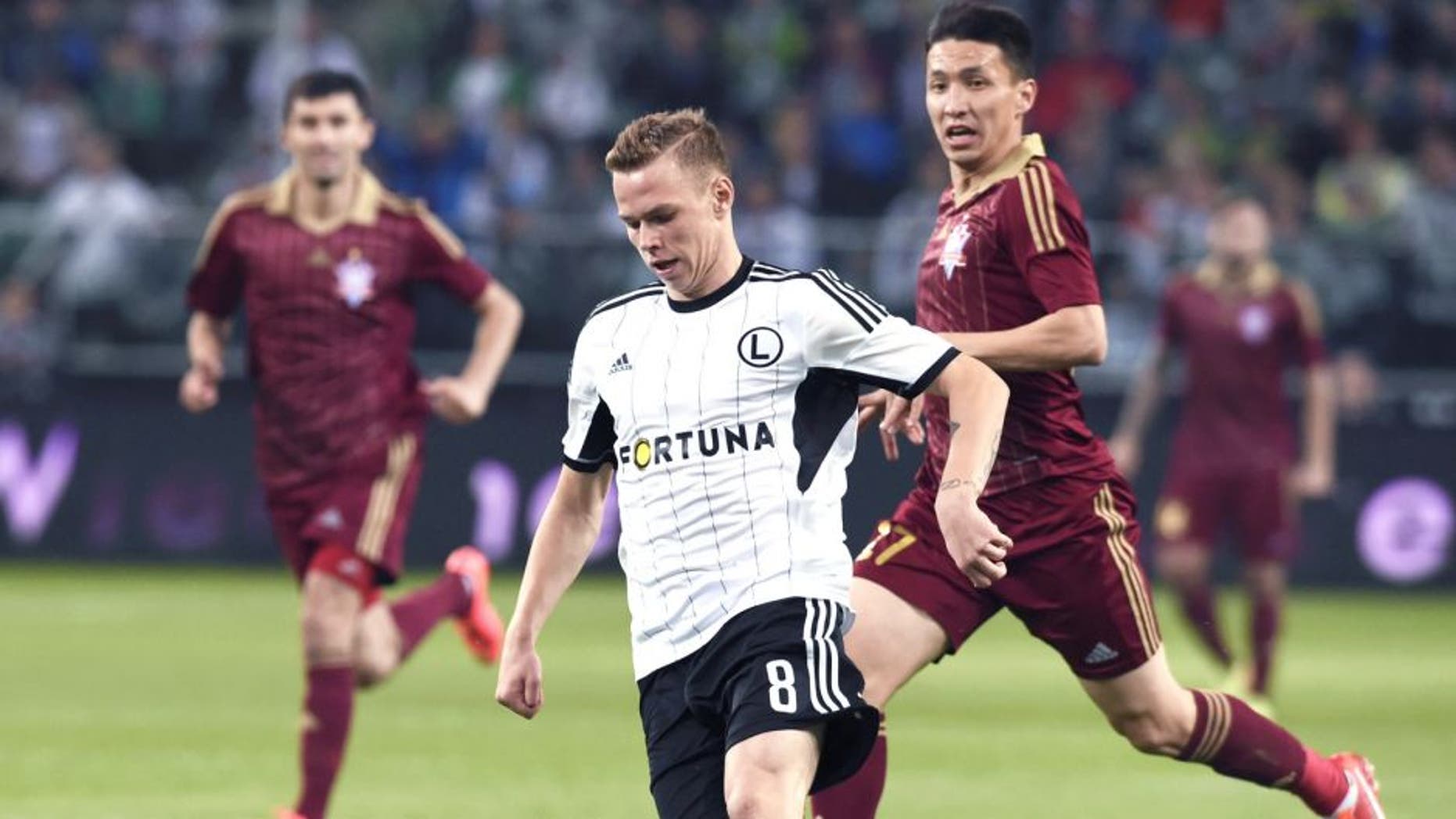 WARSAW, POLAND - AUGUST 28: (SOUTH AFRICA AND POLAND OUT) Ondrej Duda (C) of Legia during the UEFA Europa League qualifying play off round second leg match between Legia Warszawa and FK Aktobe at the Polish Army Stadium on August 28, 2014 in Warsaw, Poland. (Photo by Adam Jagielak/Gallo Images/Getty Images)