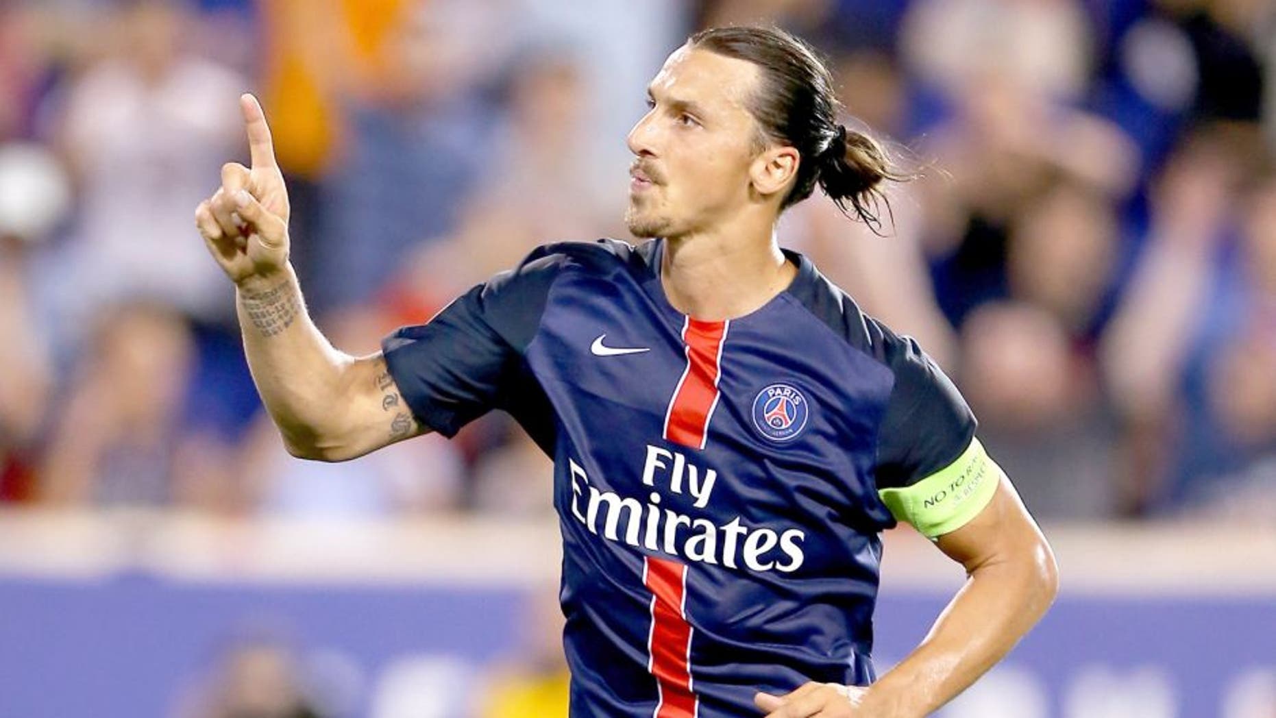 HARRISON, NJ - JULY 21: Zlatan Ibrahimovic #10 of Paris Saint-Germain celebrates his goal in the second half against AFC Fiorentina during the International Champions Cup at Red Bull Arena on July 21, 2015 in Harrison, New Jersey.Paris Saint-Germain defeated ACF Fiorentina 4-2. (Photo by Elsa/Getty Images)