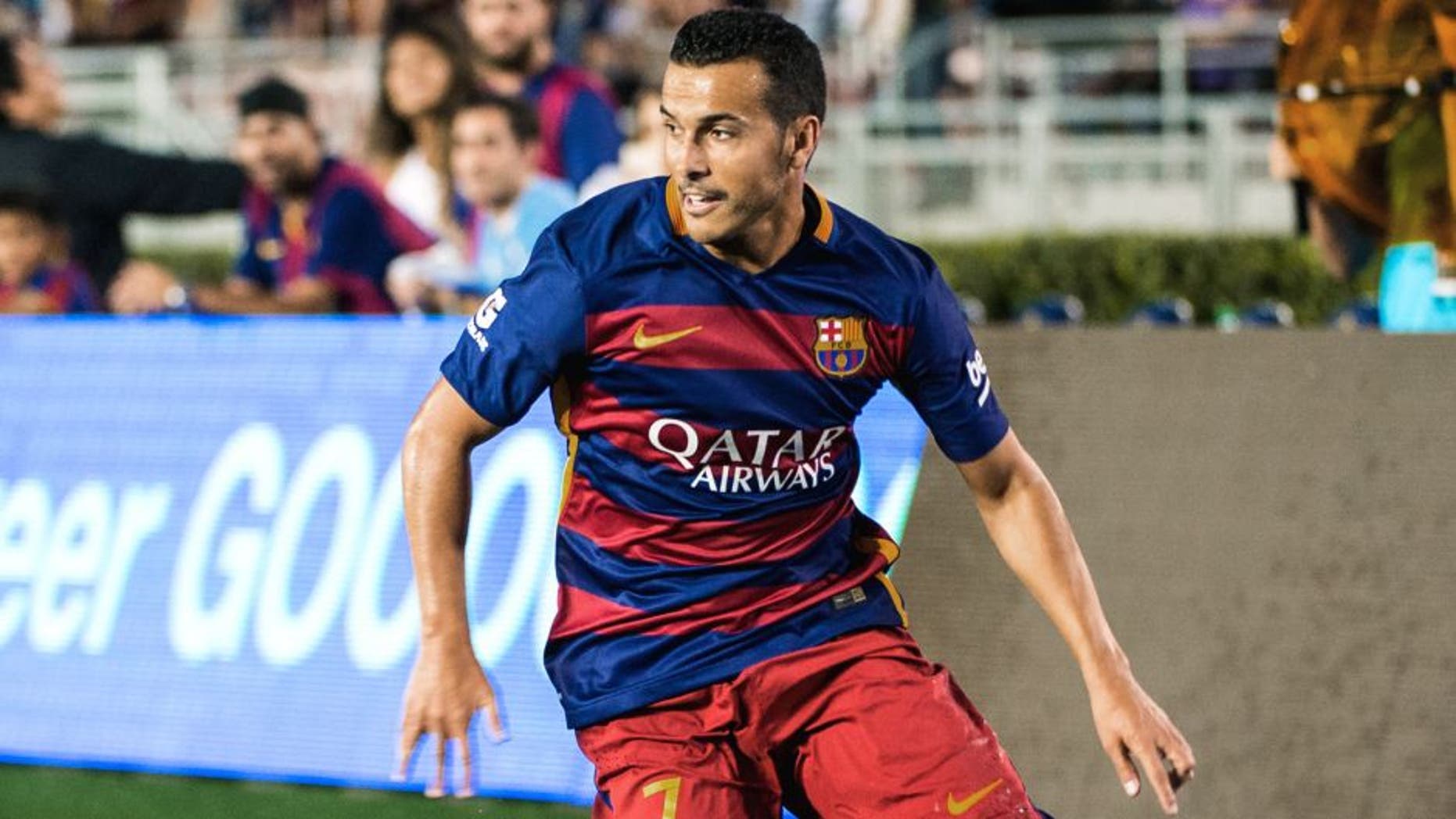 PASADENA, CA - JULY 21: Pedro #7 of Barcelona brings the ball down the wing during the International Champions Cup 2015 match between FC Barcelona and Los Angeles Galaxy at the Rose Bowl on July 21, 2015 in Pasadena, California. Barcelona won the match 2-1 (Photo by Shaun Clark/Getty Images)