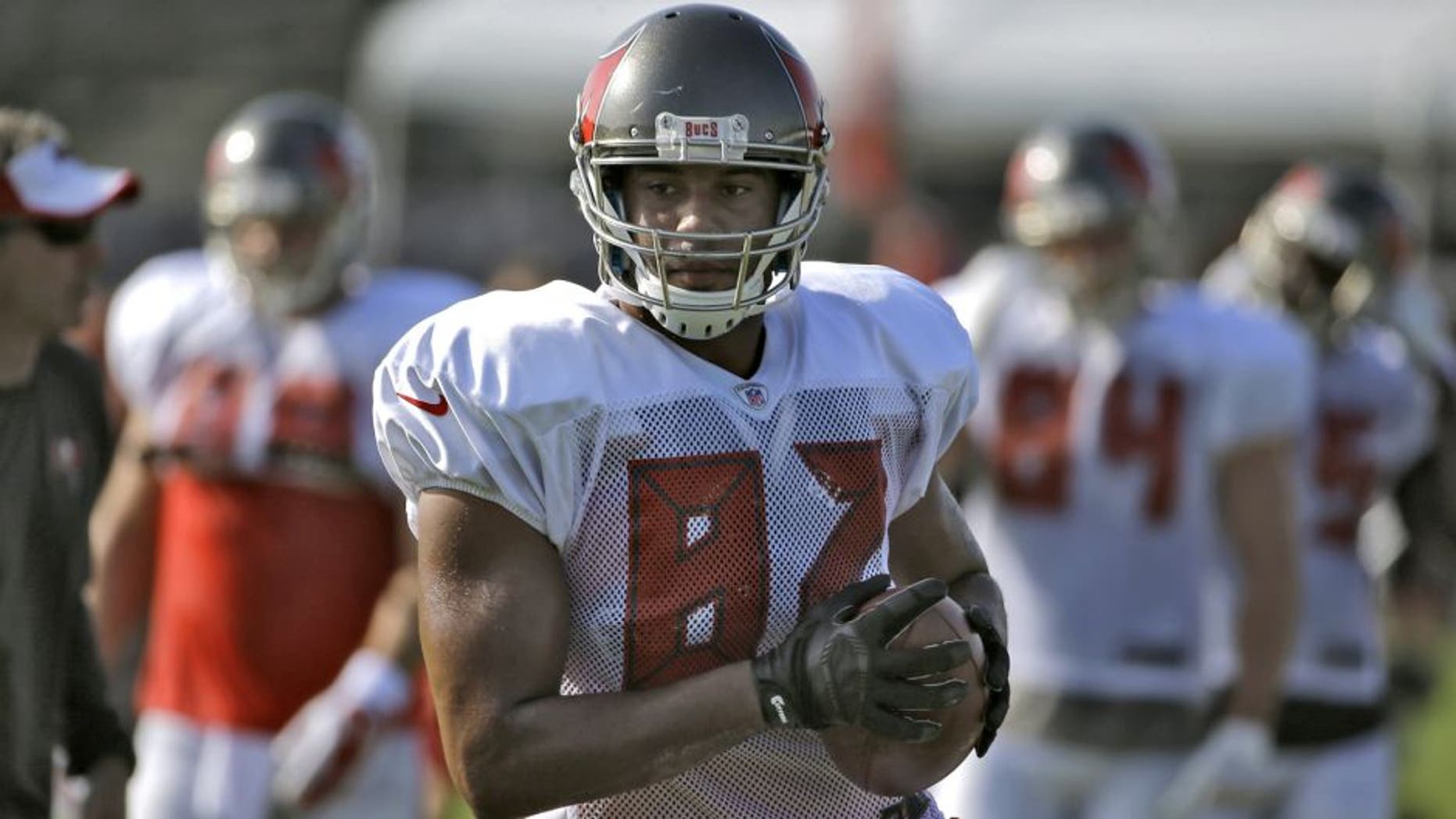 Tampa Bay Buccaneers tight end Austin Seferian-Jenkins (87) runs with the football after a reception during NFL football training camp, Tuesday, Aug. 4, 2015, in Tampa, Fla. (AP Photo/Chris O'Meara)