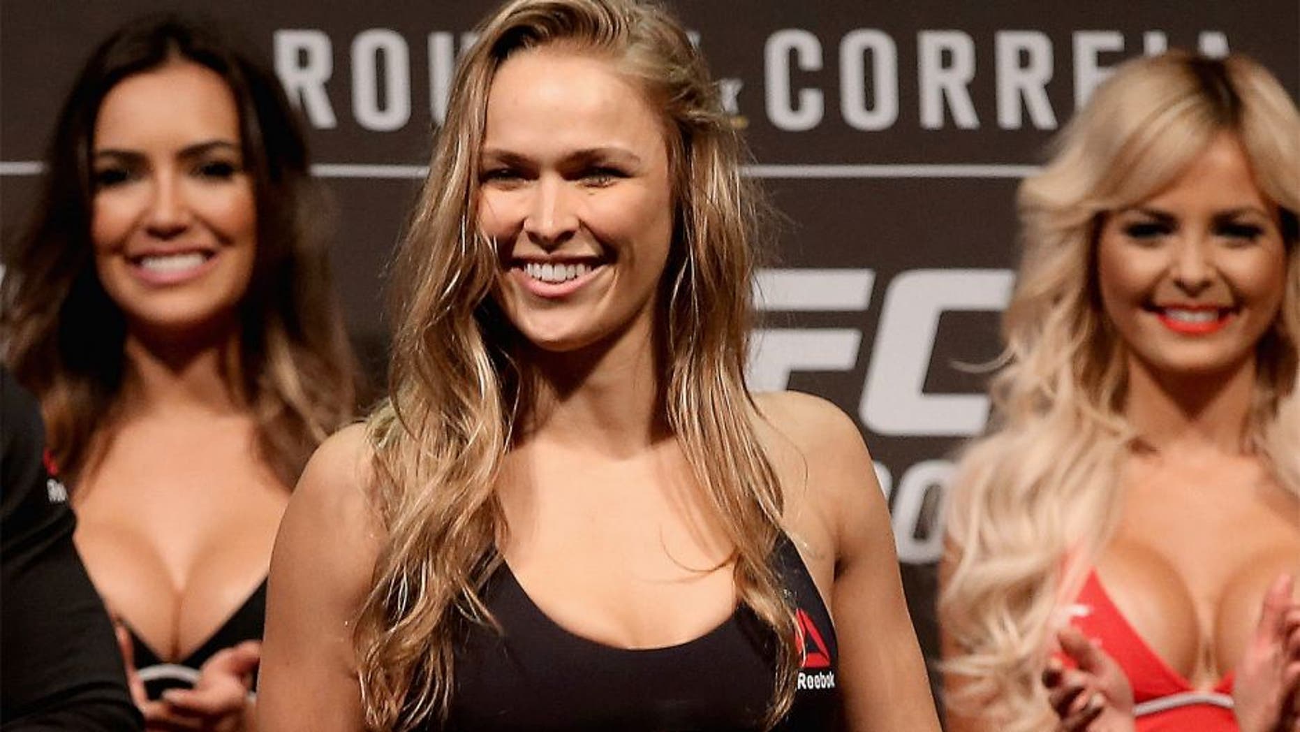 RIO DE JANEIRO, BRAZIL - JULY 31: UFC Strawweight Champion Ronda Rousey of the United States steps onto the scale during the UFC 190 Rousey v Correia weigh-in at HSBC Arena on July 31, 2015 in Rio de Janeiro, Brazil. (Photo by Matthew Stockman/Getty Images)