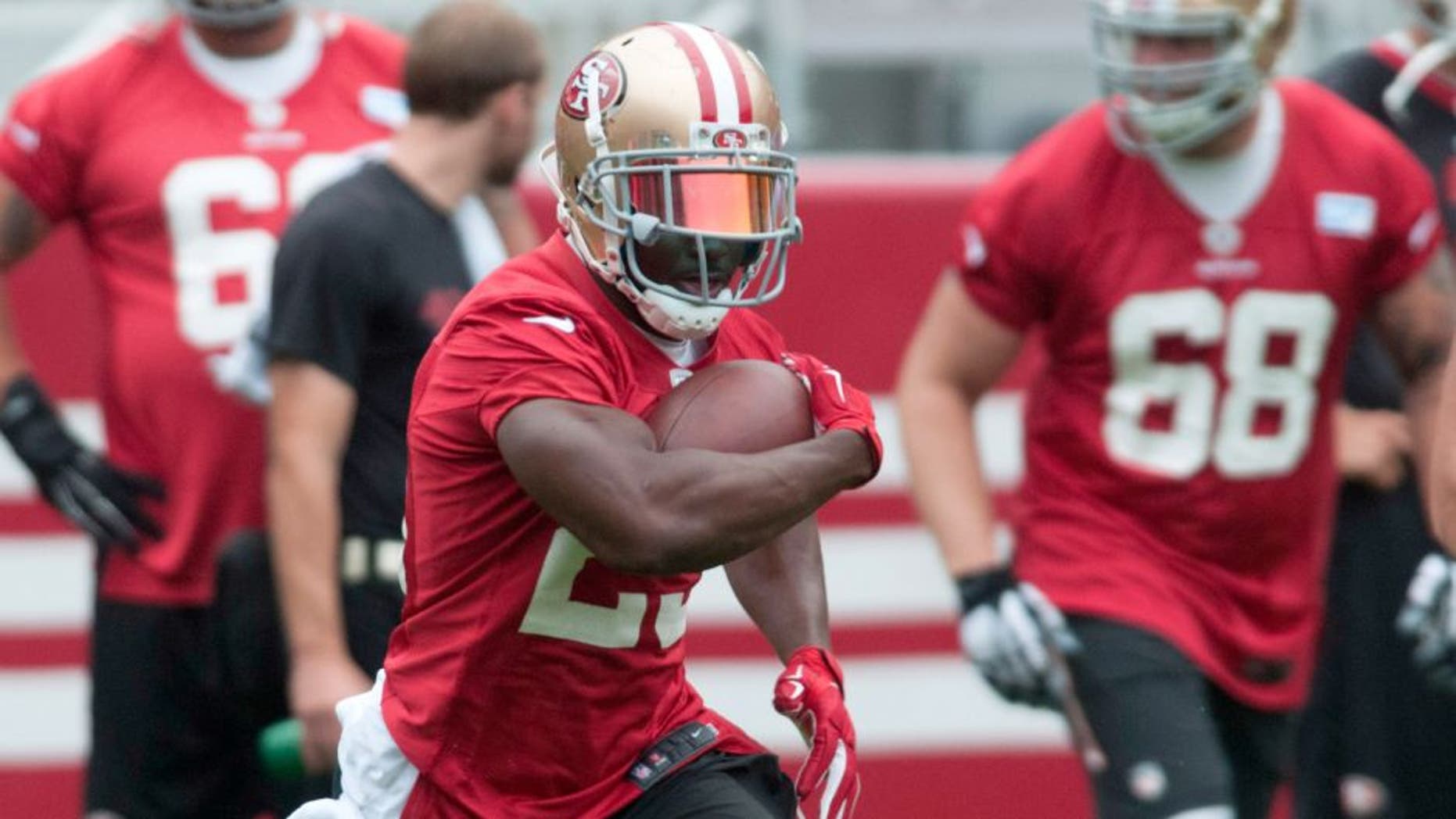 Jun 11, 2015; San Francisco, CA, USA; San Francisco 49ers running back Reggie Bush (23) carries the ball during minicamp at Levi's Stadium. Mandatory Credit: Ed Szczepanski-USA TODAY Sports