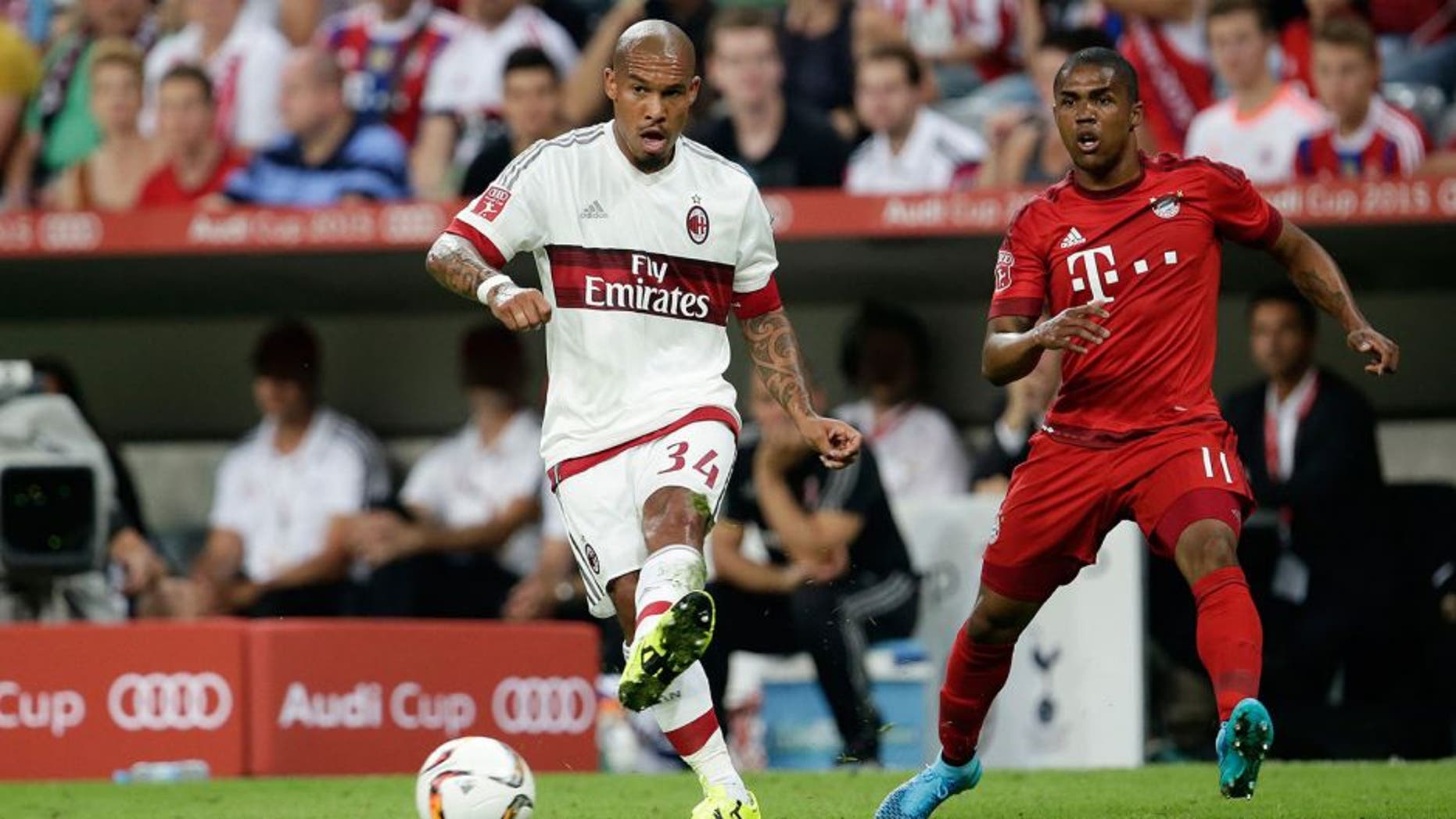 (L-R) Nigel de Jong of AC Milan, Douglas Costa of FC Bayern Munchen during the AUDI Cup match between FC Bayern Munich and AC Milan on August 4, 2015 at the Allianz Arena in Munich, Germany(Photo by VI Images via Getty Images)