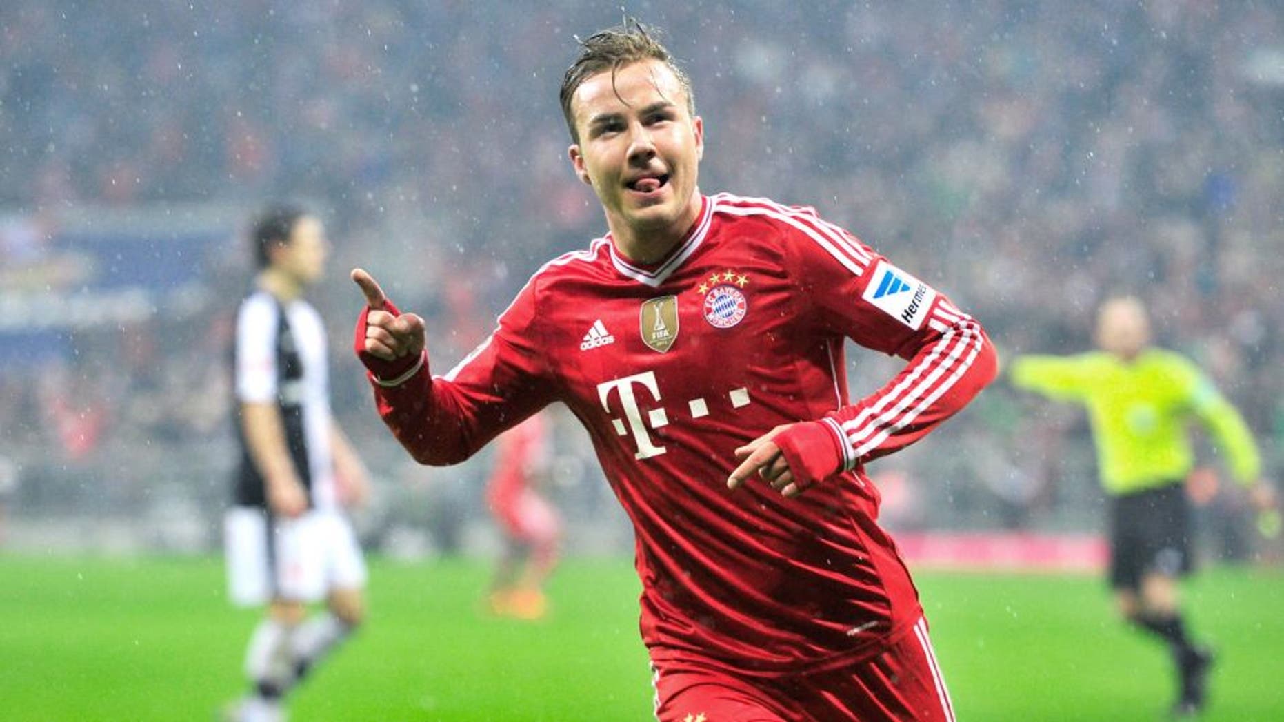 MUNICH, GERMANY - FEBRUARY 02: Mario Goetze of Muenchen celebrates his opening goal during the Bundesliga match between FC Bayern Muenchen and Eintracht Frankfurt at Allianz Arena on February 2, 2014 in Munich, Germany. (Photo by Lennart Preiss/Bongarts/Getty Images)