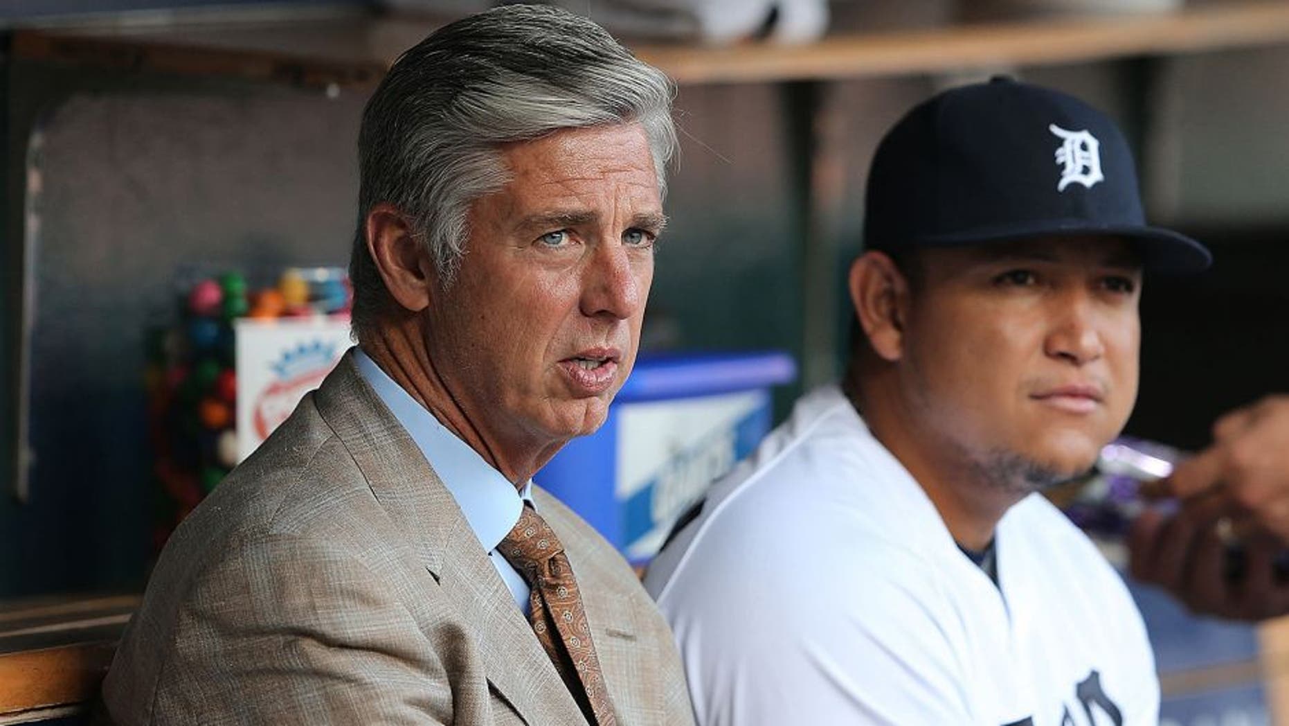 DETROIT, MI - AUGUST 02: Detroit Tigers President and General Manager Dave Dombrowski sits next to Miguel Cabrera #24 prior to the start of the game against the Colorado Rockies at Comerica Park on August 2, 2014 in Detroit, Michigan. The Tigers defeated the Rockies 11-4. (Photo by Leon Halip/Getty Images) *** Local Caption *** Dave Dombrowski; Miguel Cabrera