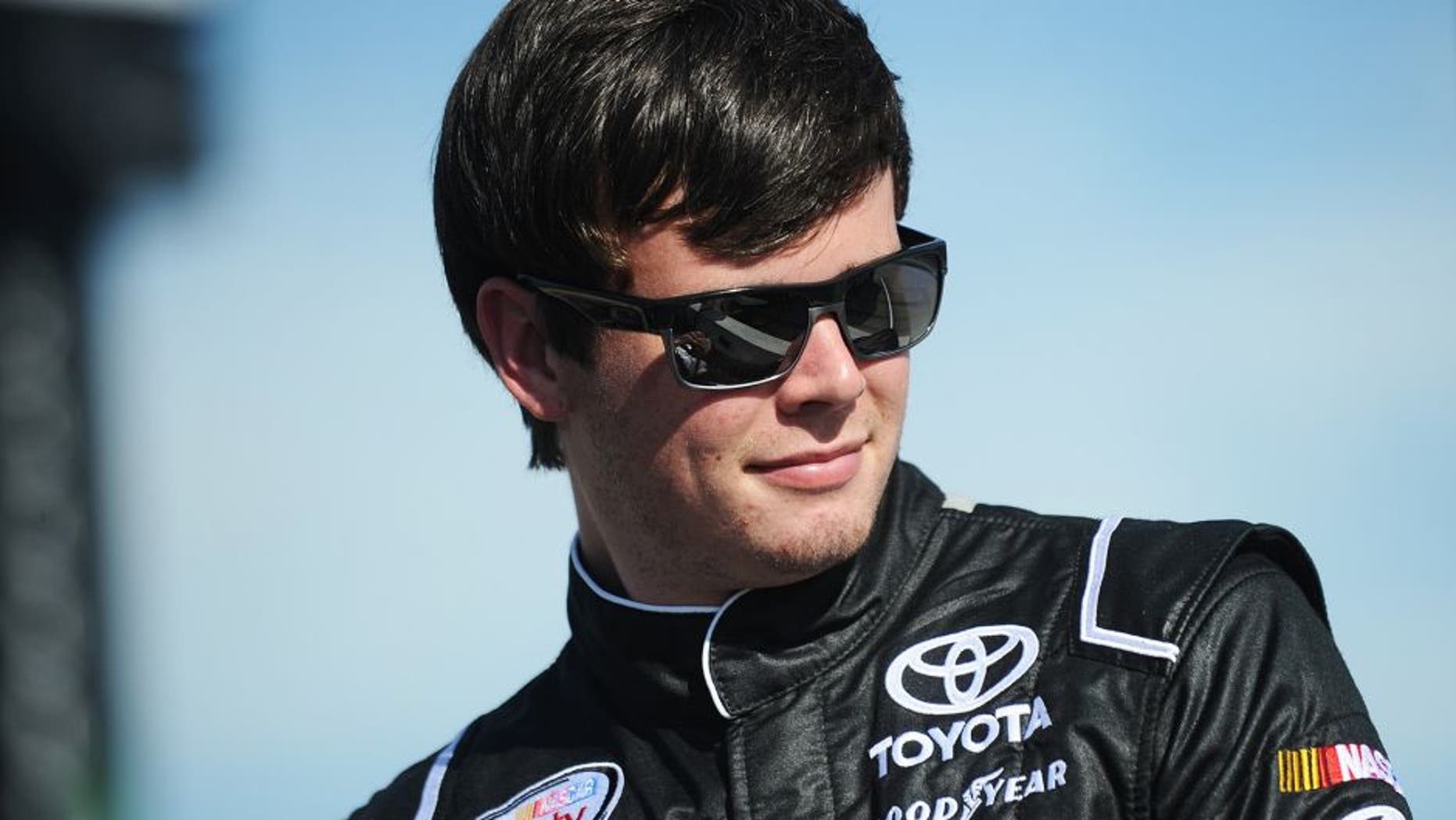 NEWTON, IA - JUNE 18: Erik Jones, driver of the #20 Freightliner Toyota, stands on pit road before qualifying for the NASCAR Xfinity Series American Ethanol E15 250 presented by Enogen at Iowa Speedway on June 18, 2016 in Newton, Iowa. (Photo by Rainier Ehrhardt/NASCAR via Getty Images)
