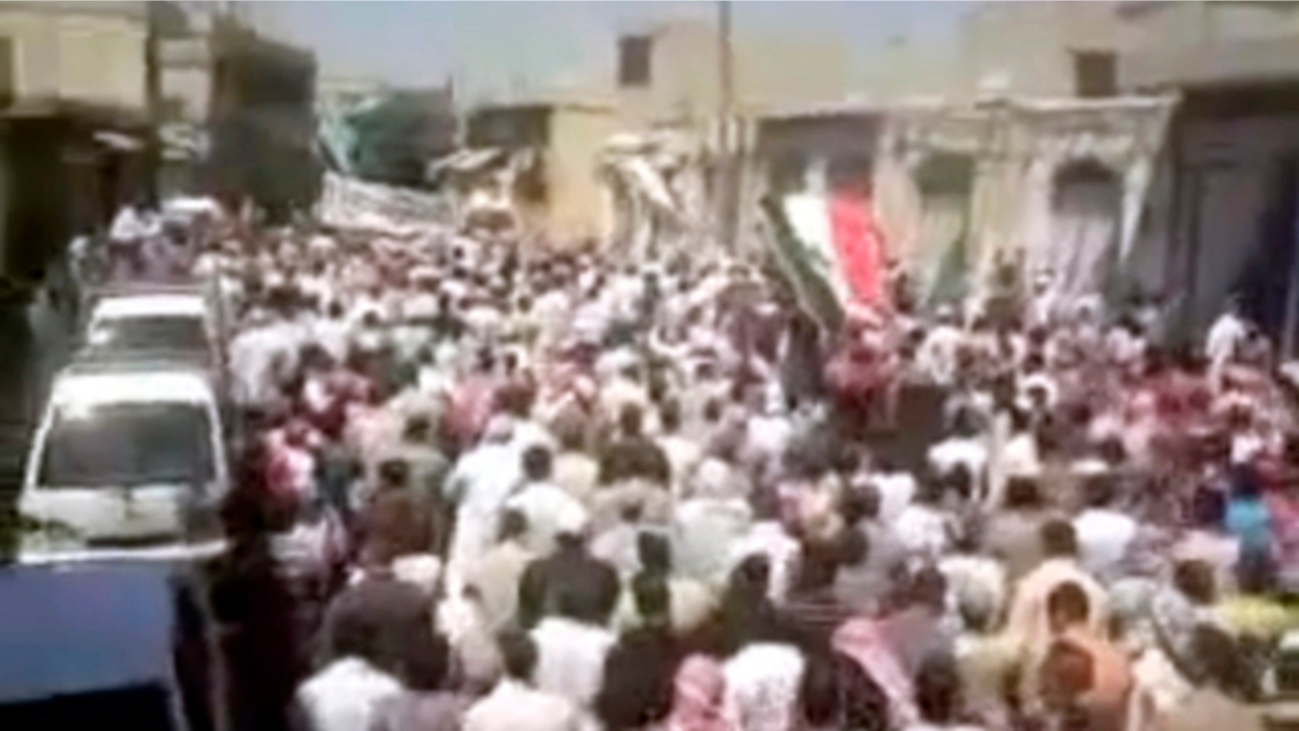 Aug. 5: In this image posted on the Internet by Shaam News Network, showing what they purport to be a demonstration in the streets of the city of Homs, Syria.