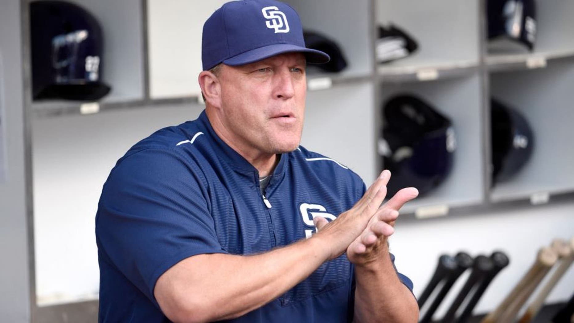 SAN DIEGO, CA - JULY 17: Interim manager Pat Murphy #24 of the San Diego Padres looks out from the dugout before a baseball game against the Colorado Rockies at Petco Park July 17, 2015 in San Diego, California. (Photo by Denis Poroy/Getty Images)