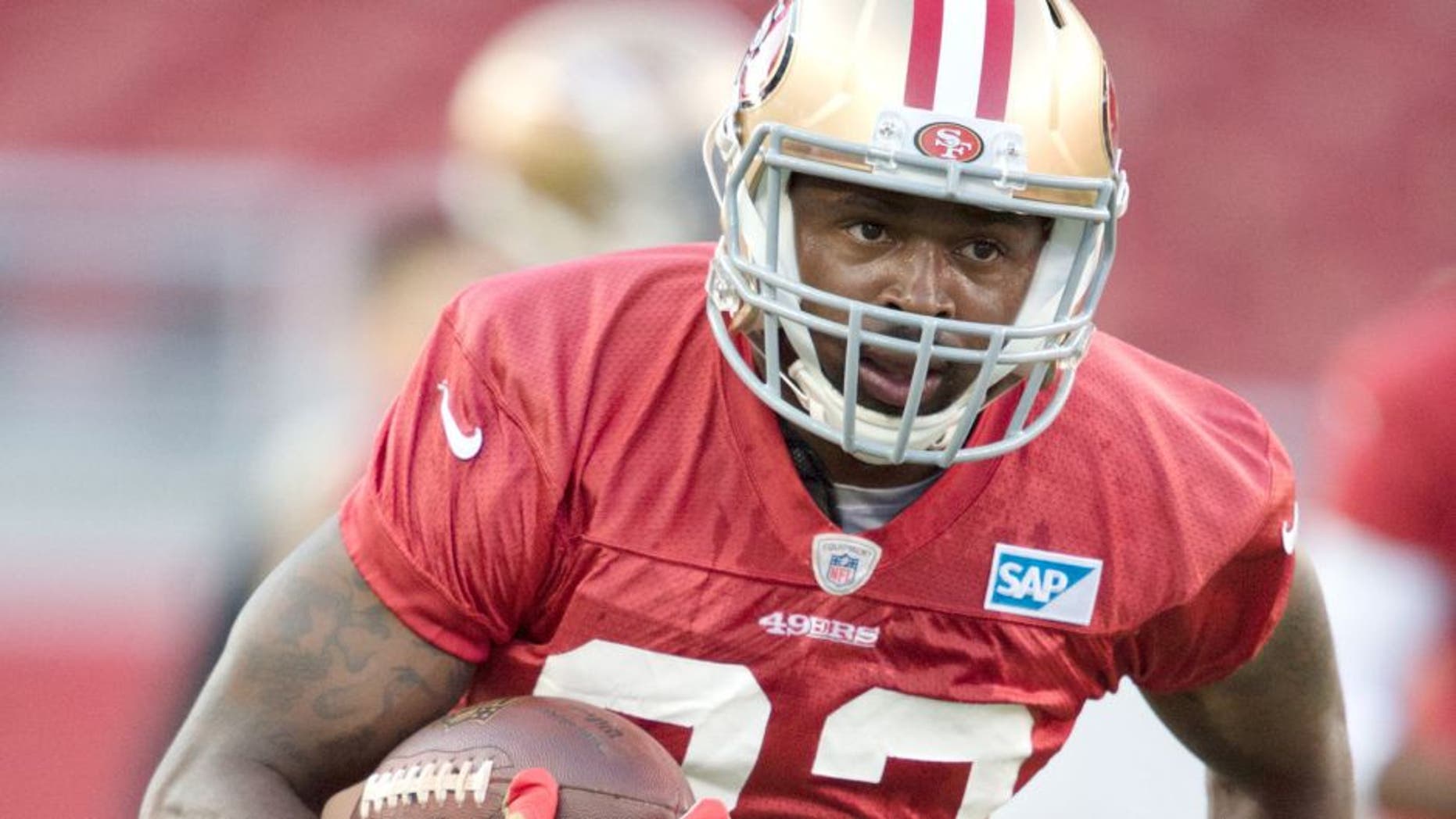 August 1, 2015; Santa Clara, CA, USA; San Francisco 49ers wide receiver Torrey Smith (82) runs with the football during training camp at Levi's Stadium. Mandatory Credit: Kyle Terada-USA TODAY Sports