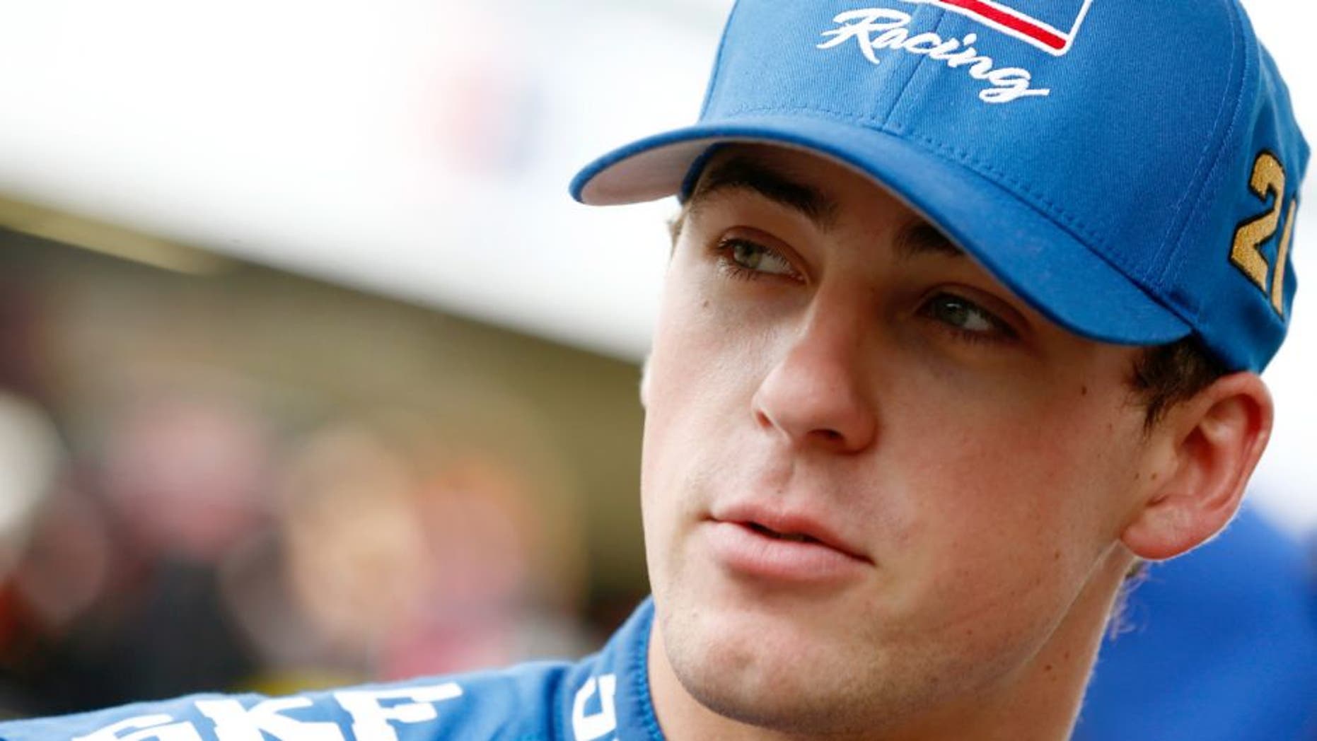 Ryan Blaney, driver of the #21 SKF Ford, stands in the garage area during practice for the NASCAR Sprint Cup Series 5-Hour Energy 301 at New Hampshire Motor Speedway on July 18, 2015 in Loudon, New Hampshire. (Photo by Jeff Zelevansky/Getty Images)