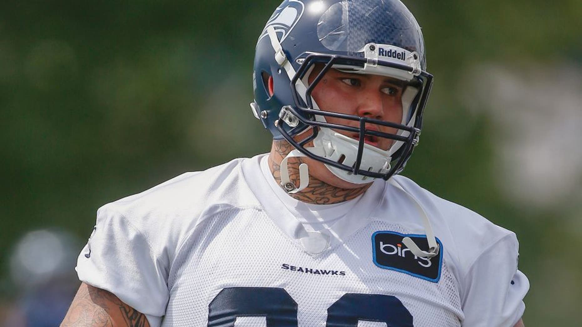 RENTON, WA - MAY 11: Defensive tackle Jesse Williams #90 of the Seattle Seahawks looks on during Rookie Camp at the Virginia Mason Athletic Center on May 11, 2013 in Renton, Washington. (Photo by Otto Greule Jr/Getty Images)