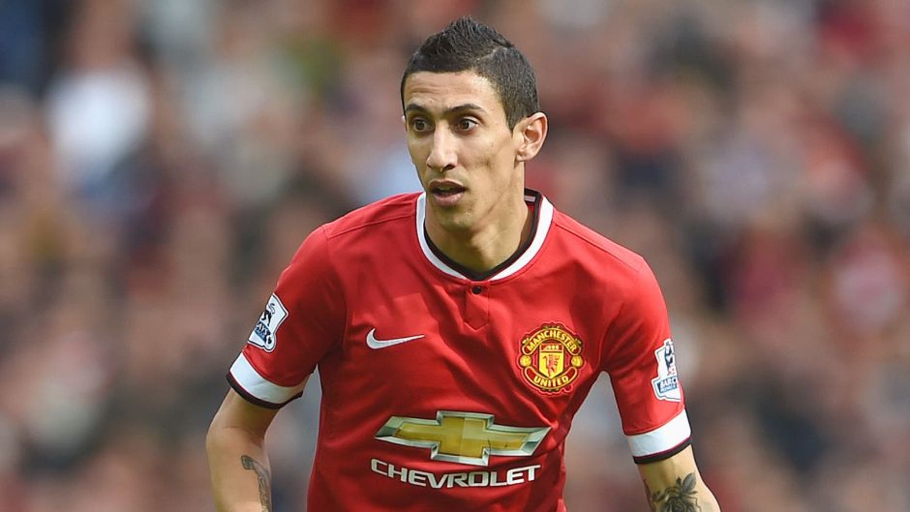 MANCHESTER, ENGLAND - OCTOBER 05: Angel Di Maria of Manchester United in action during the Barclays Premier League match between Manchester United and Everton at Old Trafford on October 5, 2014 in Manchester, England. (Photo by Michael Regan/Getty Images)