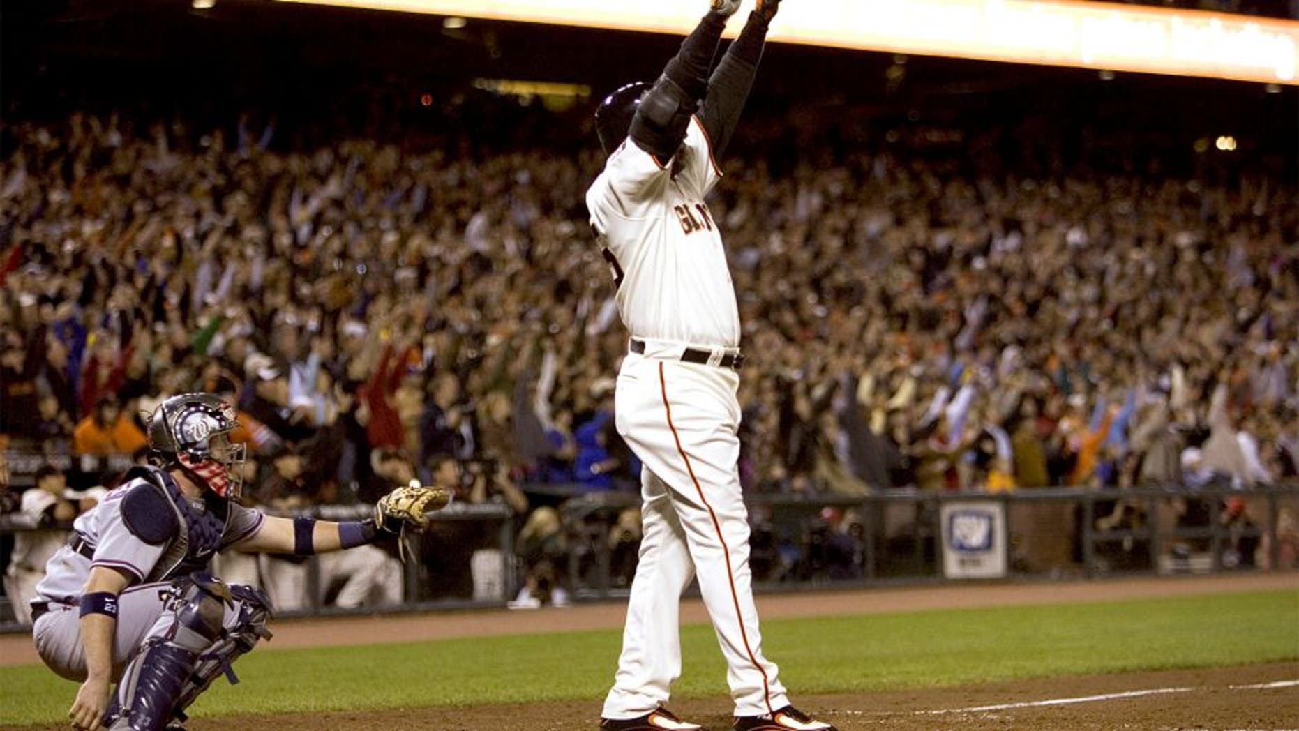 San Francisco Giants' Barry Bonds celebrates home run number 756 to break Hank Aaron's home run record in the fifth inning against the Washington Nationals at AT&T Park in San Francisco California, Tuesday, August 7, 2007. (Paul Kitagaki Jr/Sacramento Bee/MCT)